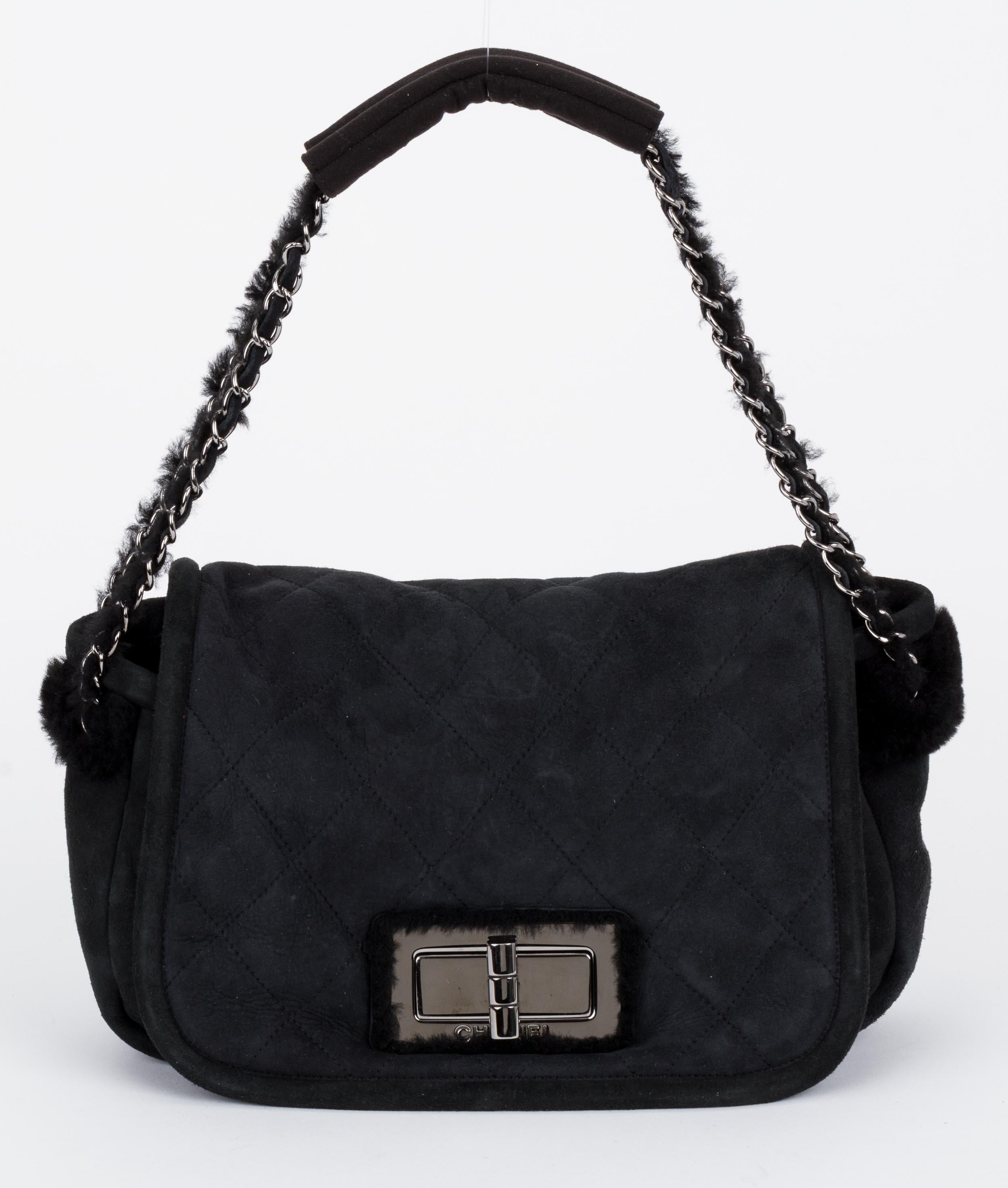 Chanel black shearling shoulder tote with ruthenium hardware. Handle drop 10