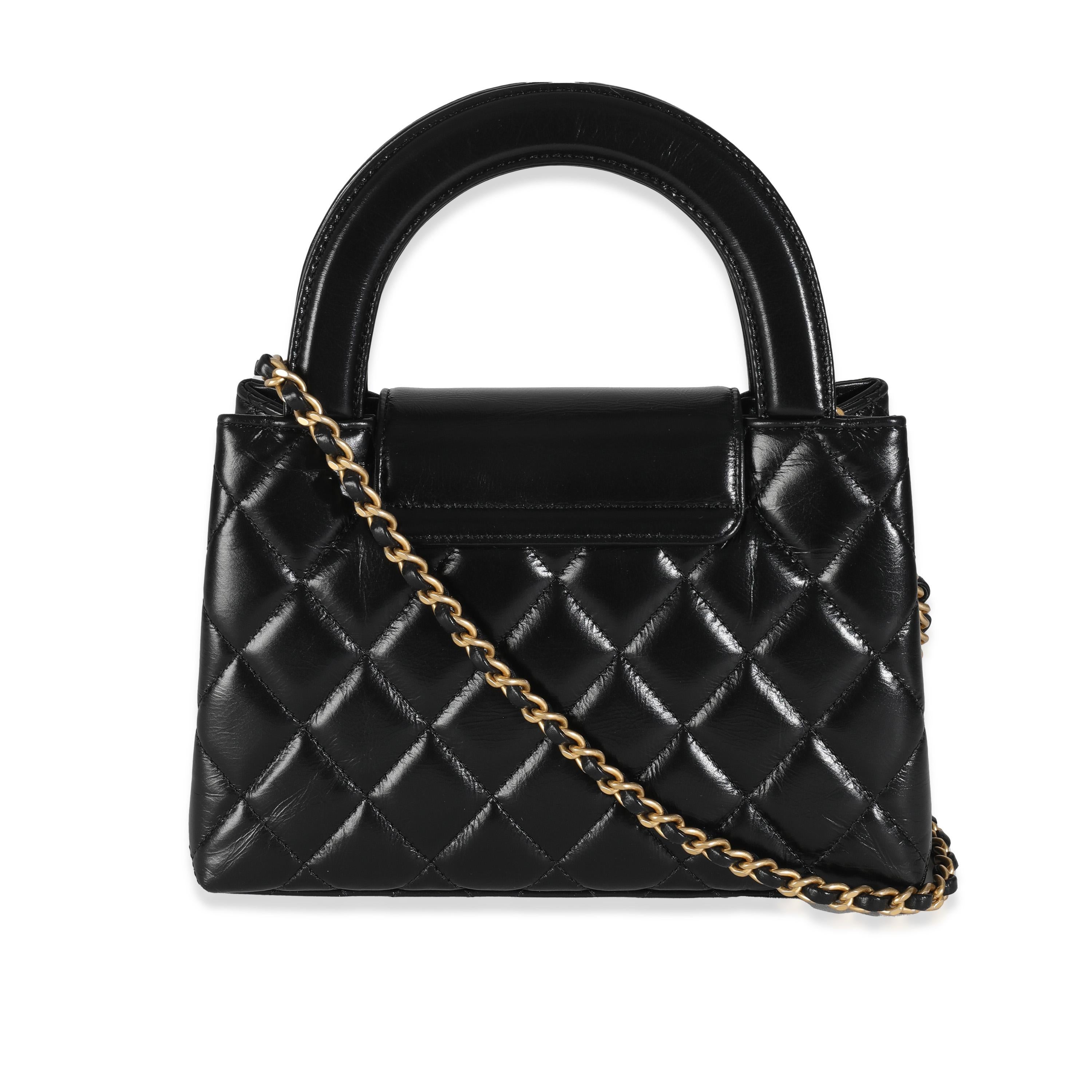 Listing Title: Chanel Black Shiny Aged Calfskin Quilted Nano Kelly Shopper
SKU: Z144515
Condition: Pre-owned 
Condition Description: Please note that this item has an additional stamp and is assumed to be a sample / employee purchase.
Handbag