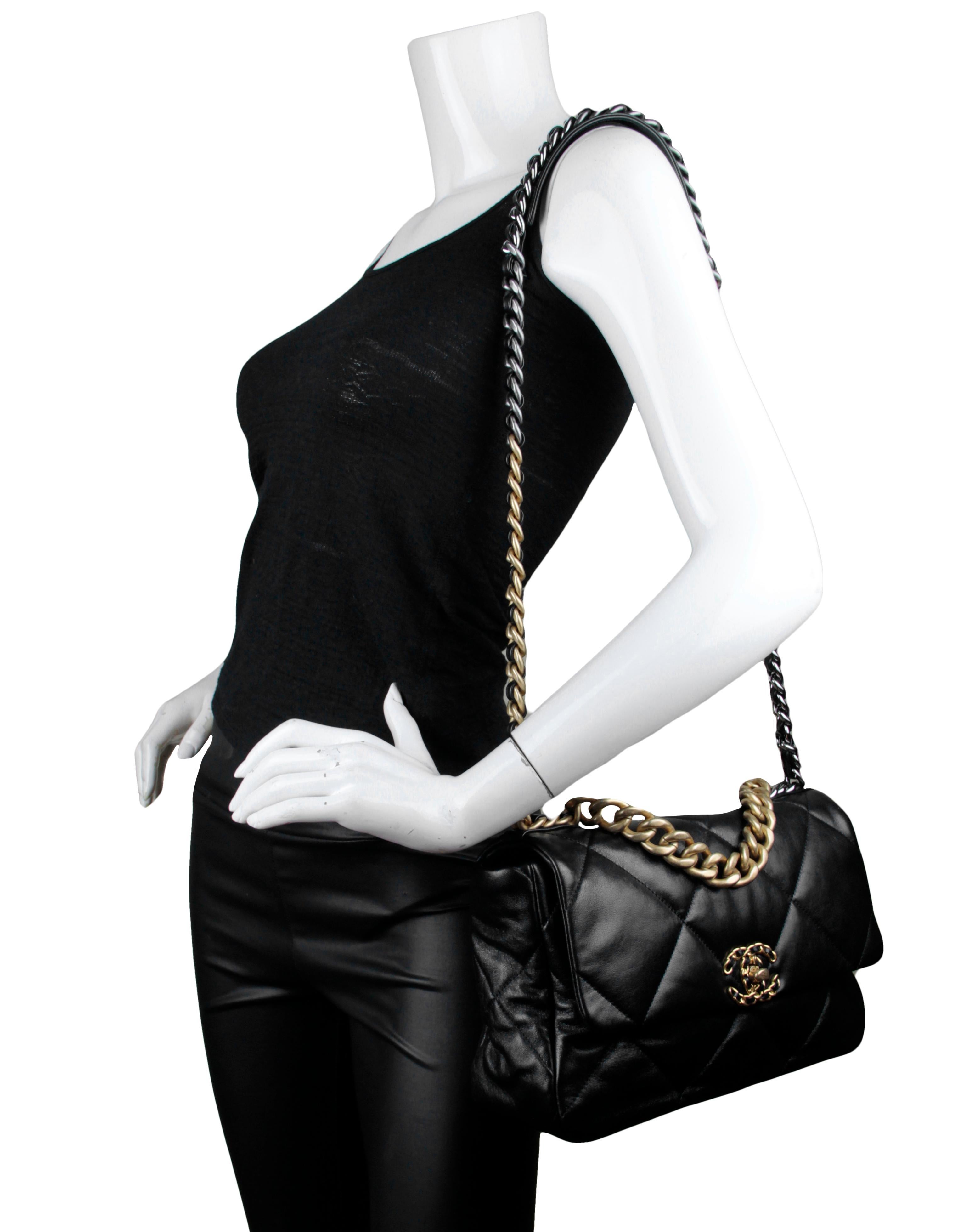 Chanel Black Shiny Calfskin Leather Quilted Large 19 Bag

Made In: Italy
Year of Production: 2020
Color: Black
Hardware: Antiqued goldtone, ruthenium, and dark silver
Materials: Shiny calfskin leather, metal
Lining: Burgundy