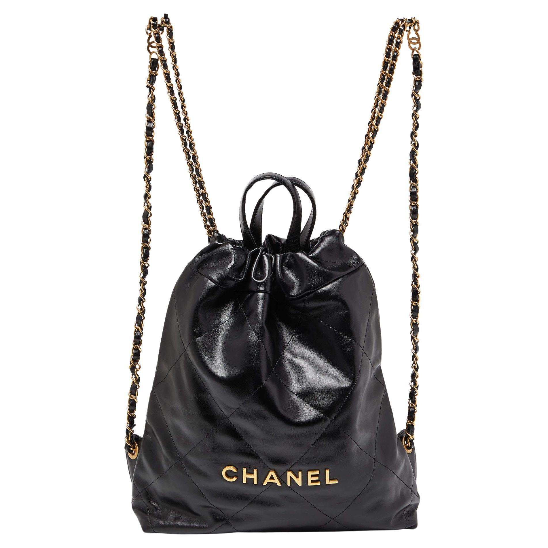 Chanel Black Shiny Quilted Leather 22 Backpack For Sale