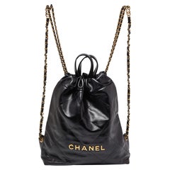 Used Chanel Black Shiny Quilted Leather 22 Backpack