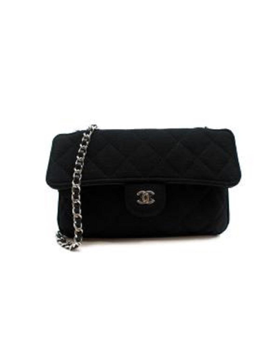 Chanel Black Shopping Tote Convertible Mini Crossbody Bag

- Can be worn across the body with the pouch tucked in and then used for larger items/shopping
-Interlocking chain strap 
-Snap fastening closure on small pouch at the front 
-Fully lined