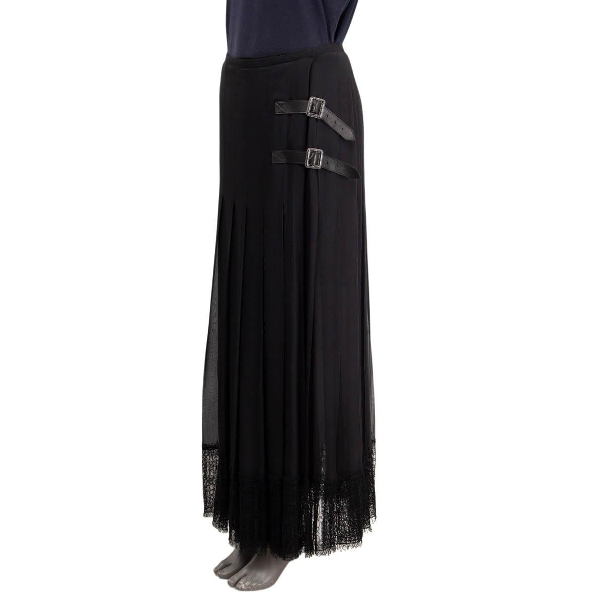 100% authentic Chanel maxi skirt in black silk (100%). Features an inset in black cotton (50%), viscose (34%) and polyamide (16%), belt strap details on the left hip side, lace details at the bottom and a A-Line fit. Has been worn and is in