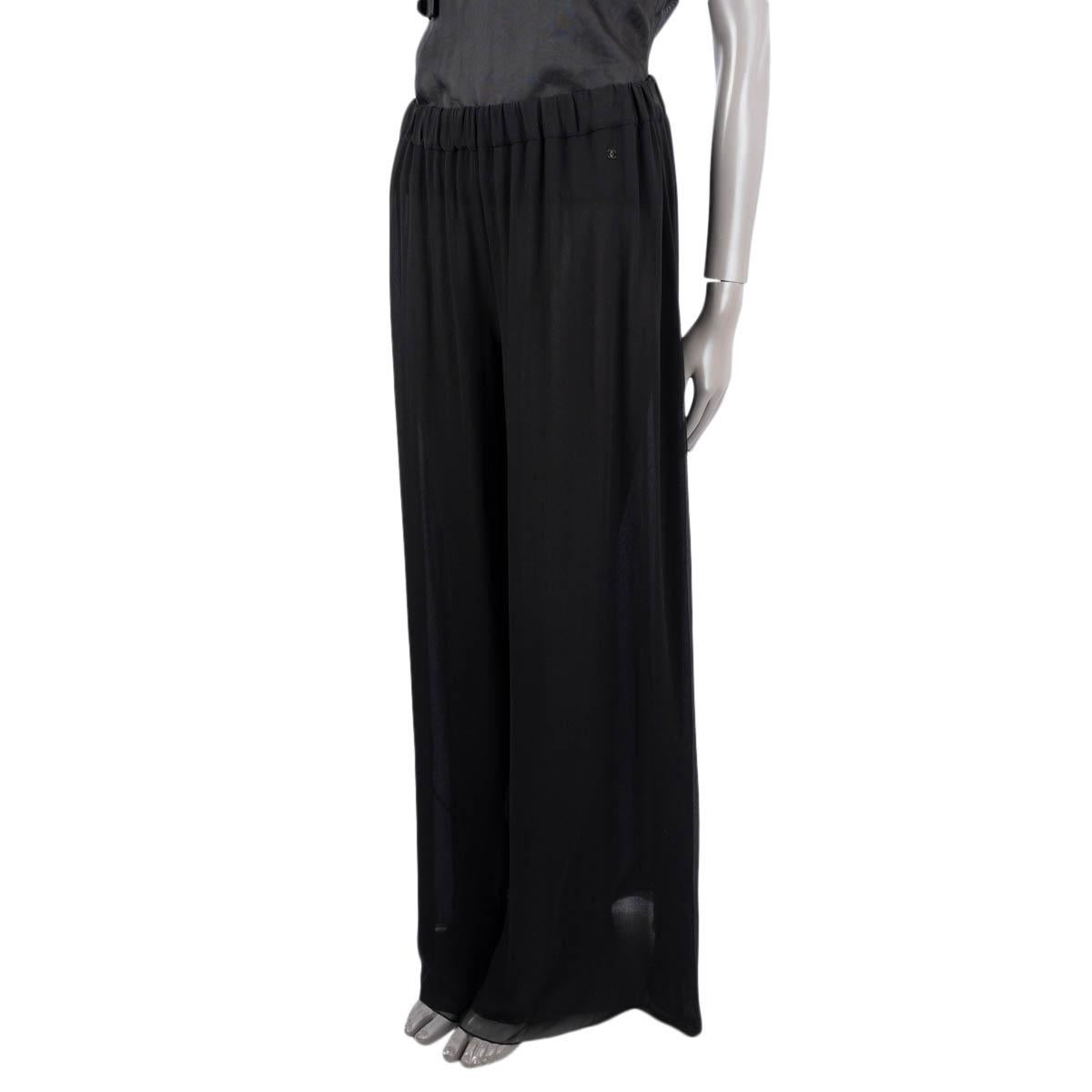 100% authentic Chanel palazzo chiffon pants in black silk (100%). The design features an elastic waistband, black silk (100%) lining and black logo metal tag. Have been worn and are in excellent condition. 

Measurements
Model	Chanel16A P54366