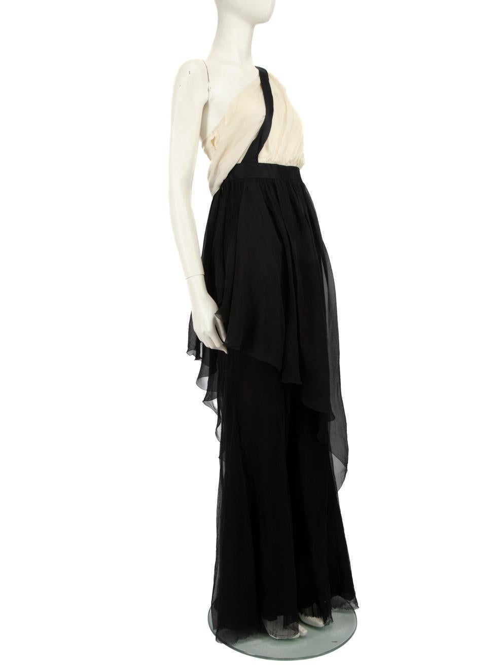 CONDITION is Very good. Minimal wear to the dress is evident. The stitching in the lining is loose, near the bust area of the dress. There is also discolouration under the left underarm on this used Chanel designer resale item.
 Details
 Black

