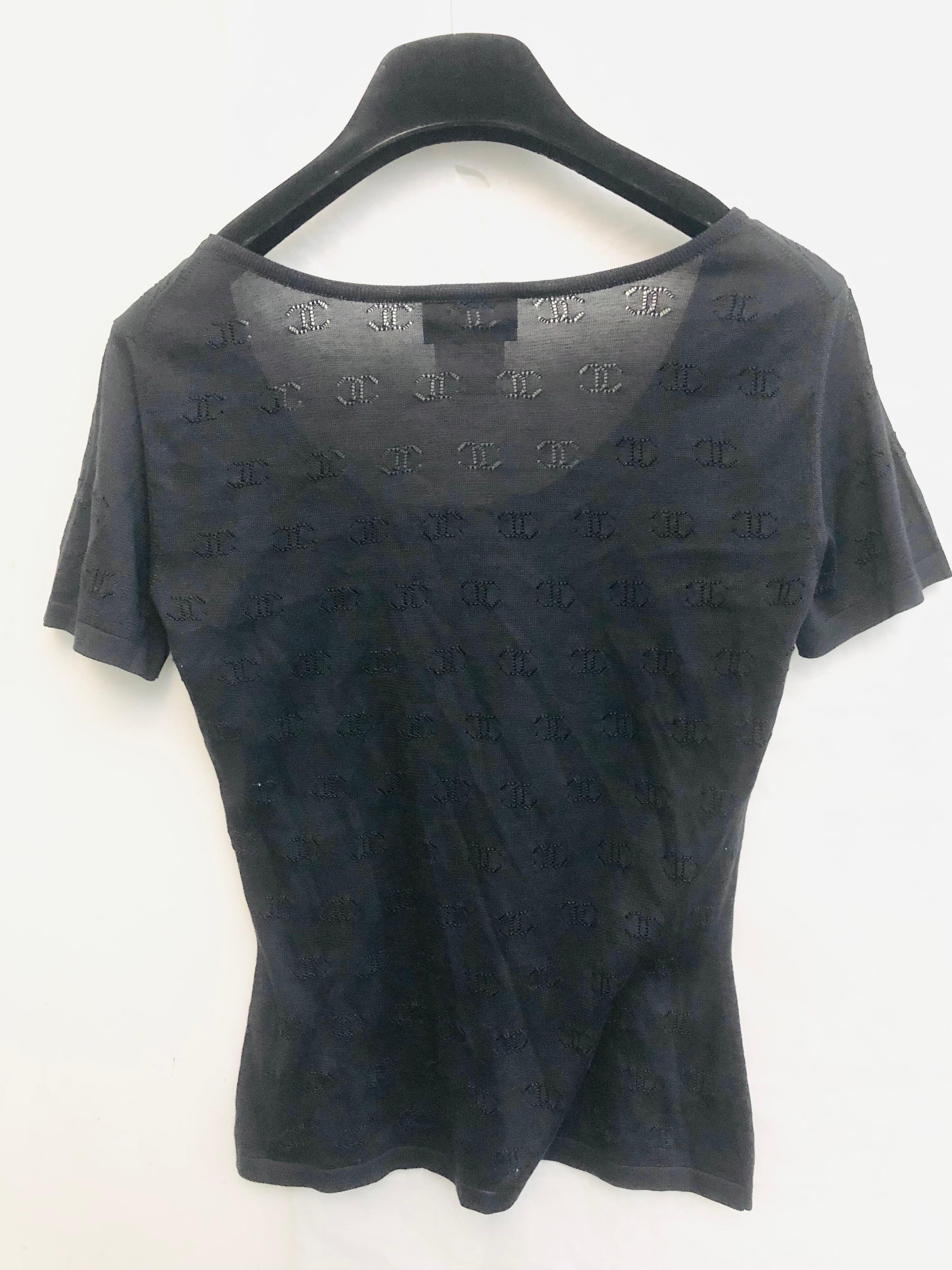 - What can be more classic and chic than a Chanel spring 1998 black silk cutout CC logo throughout  short sleeves top? it is a very long lasting item to wear for years! 

- Size 40. 

- 100% silk. 

