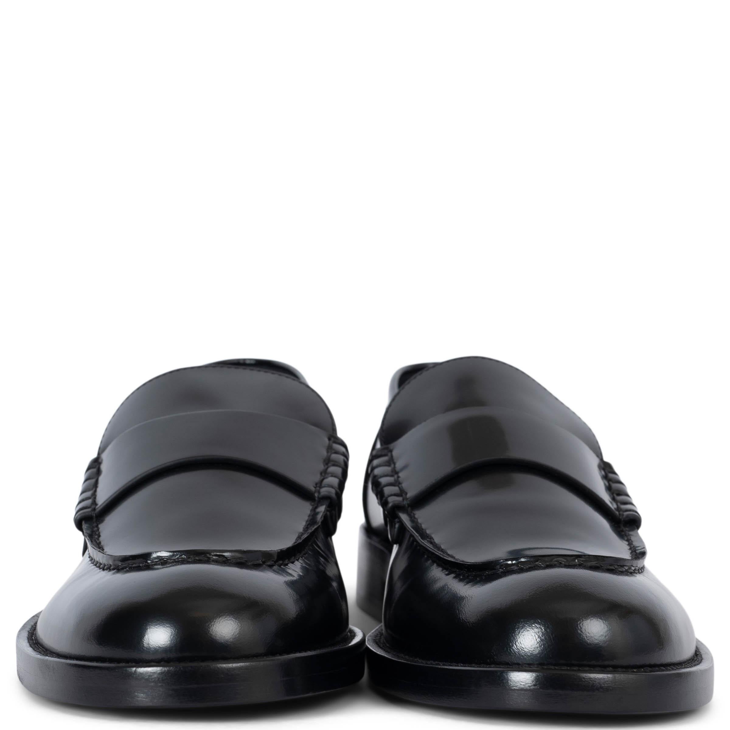 100% authentic Chanel loafers in black shiny calfskin featuring metal logo lettering on the heel. Brand new. Come with dust bag. 

2023 Spring/Summer

Measurements
Model	23S G39190 X56995 94305
Imprinted Size	41.5 (run small)
Shoe Size	41
Inside