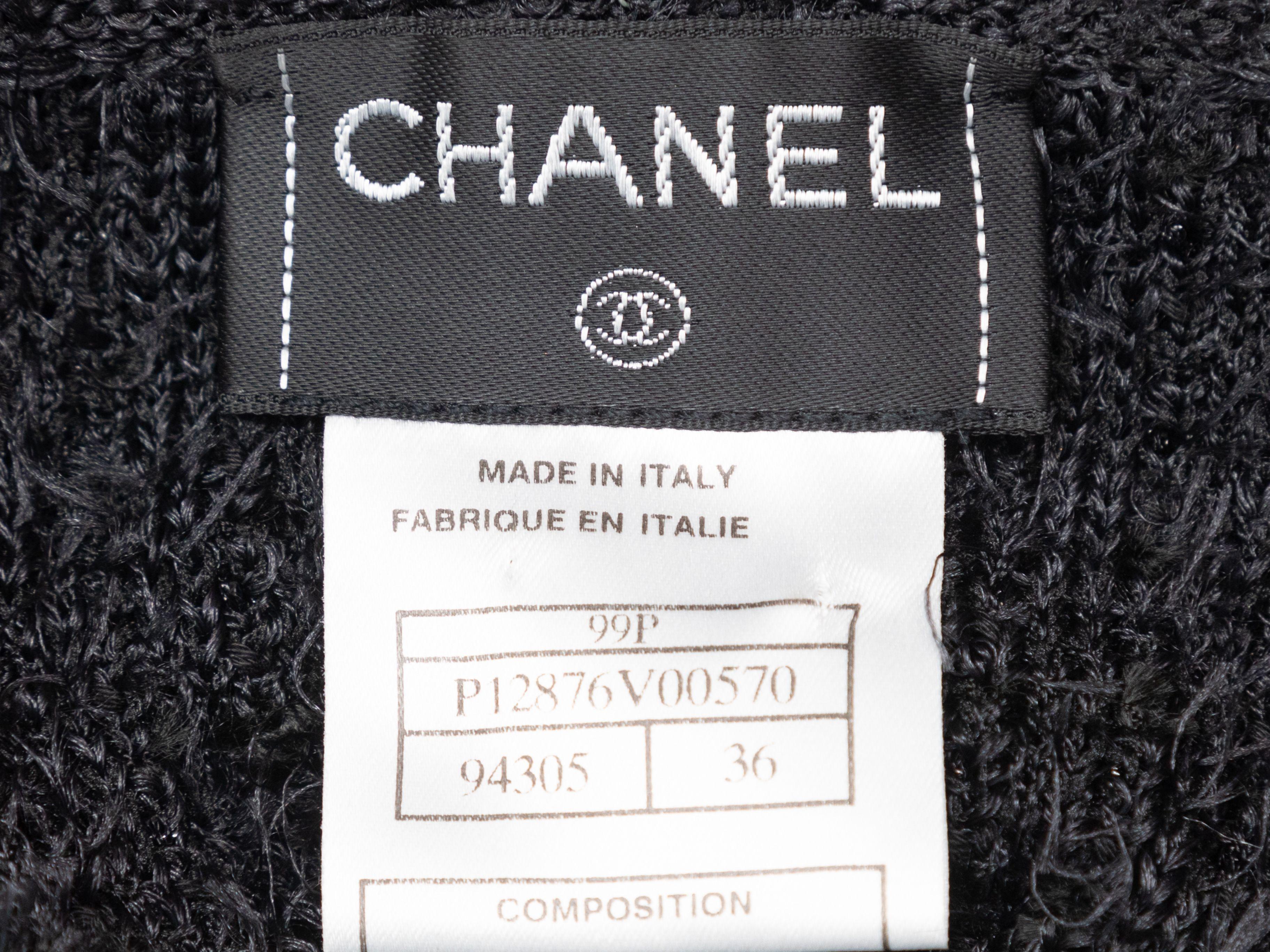 Product Details: Vintage black and silver metallic cami top by Chanel. Circa 1999. Scoop neckline. Narrow straps. 28