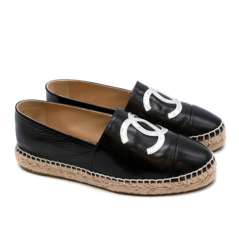 Chanel Black & Silver Lambskin CC Espadrilles
-Soft leather material
-Stunning iconic CC logo in silver
-Leather insoles for added comfort
-Woven double midsoles
-Black cap rounded toe
-Slip-on
-Casual, chic, timeless design

Materials: Lambskin