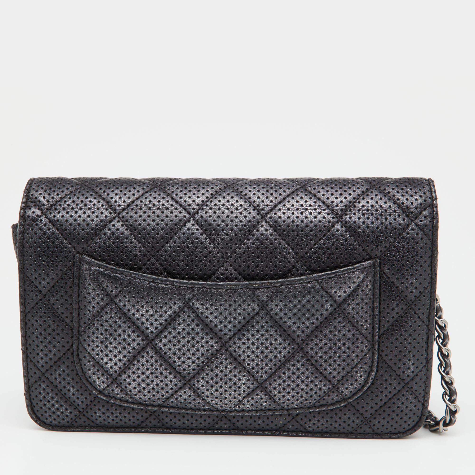 Trust this Chanel WOC to be light, durable, and comfortable to carry. Crafted from leather, it comes in a black shade. It features a canvas interior, a long strap, and a logo at the front.

