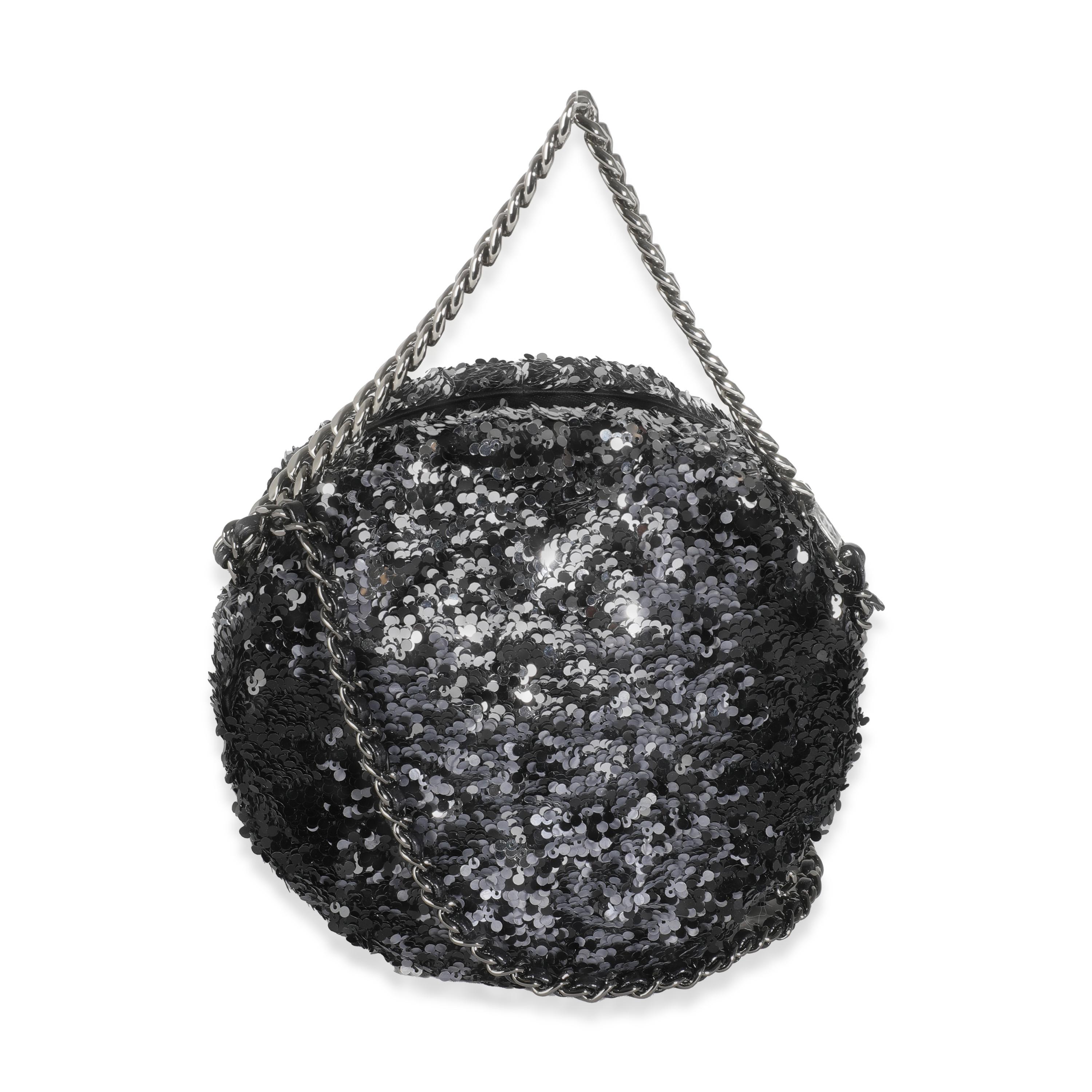 Listing Title: Chanel Black Silver Sequin Round Chain Bag
SKU: 143383
Condition: Pre-owned 
Handbag Condition: Pristine
Condition Comments: Item has no indication of wear.   Final sale.
Brand: Chanel
Model: Round Chain Bag
Origin Country: