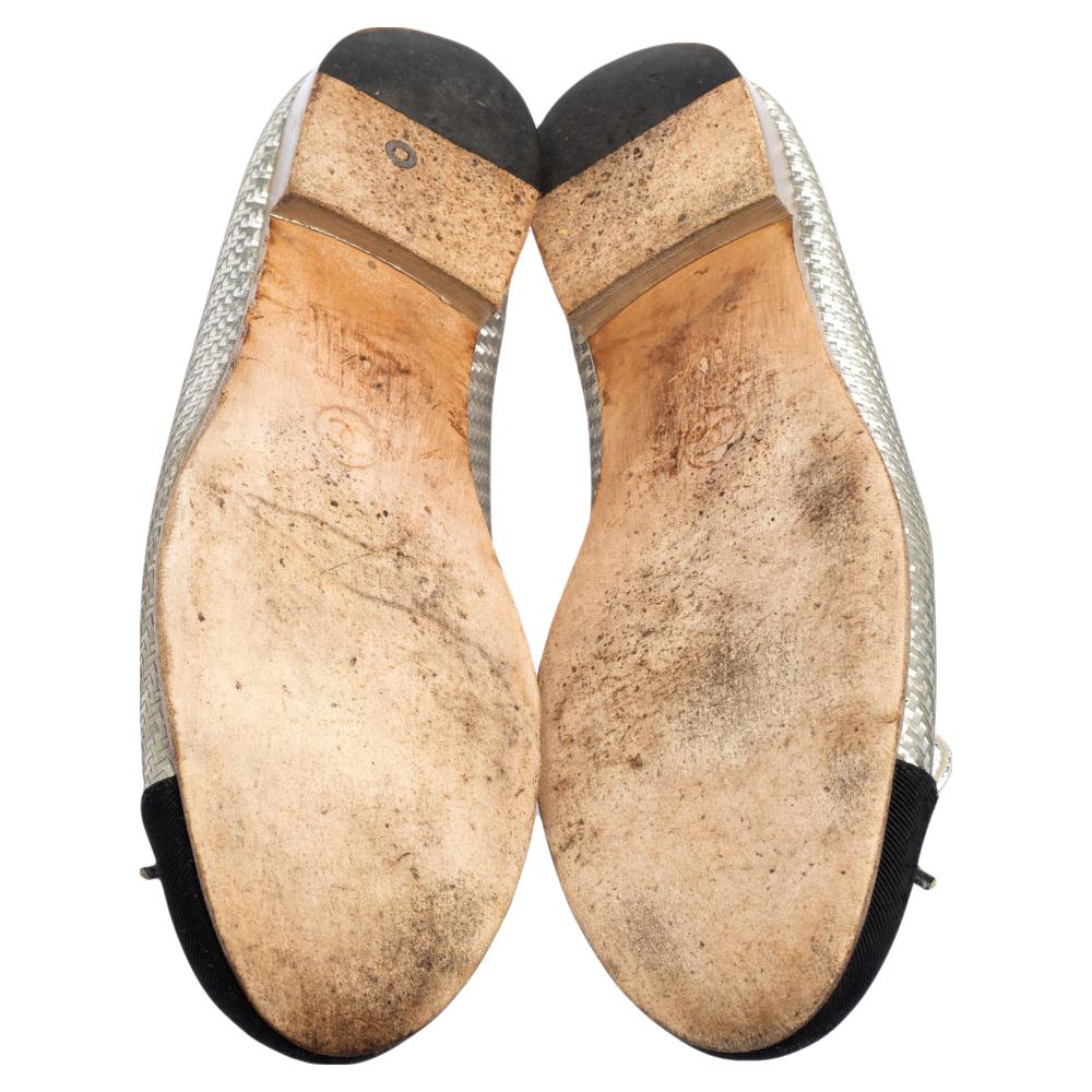 These silver ballet flats will be your first choice when you are out for long hours because they provide excellent comfort. They are crafted from leather and designed with fabric cap toes with the CC logo, and little bows.

Includes: Original Dustbag