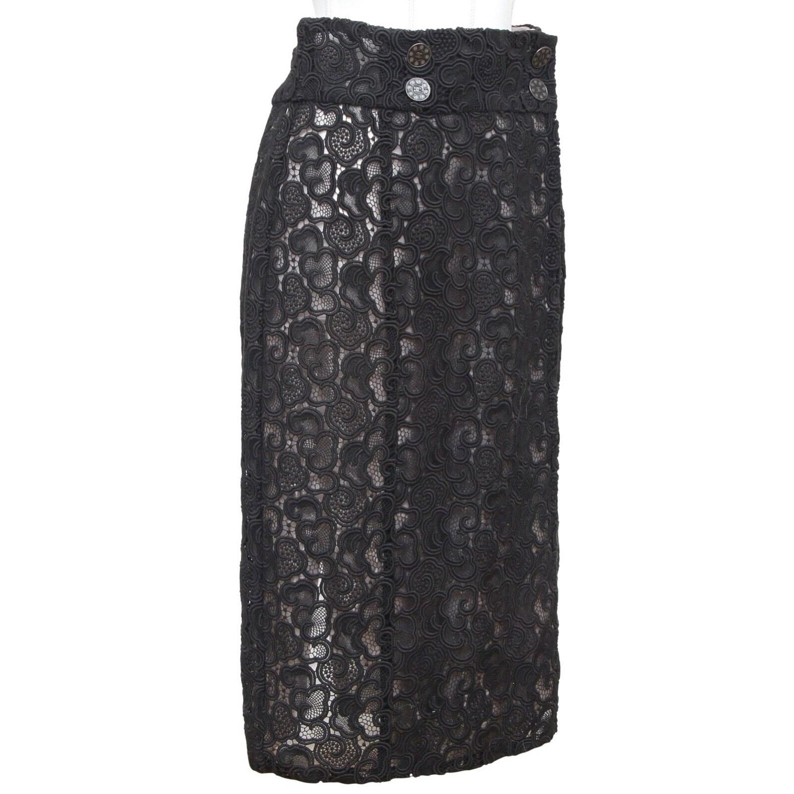 GUARANTEED AUTHENTIC CHANEL PARIS SEOUL 2016 BLACK LACE SKIRT


Design:
- Stunning heavier weight cotton blend faux wrap lace skirt.
- Faux double collection buttons at front waistline.
- Concealed front buttons closure.
- Rear vent.
- Fully lined