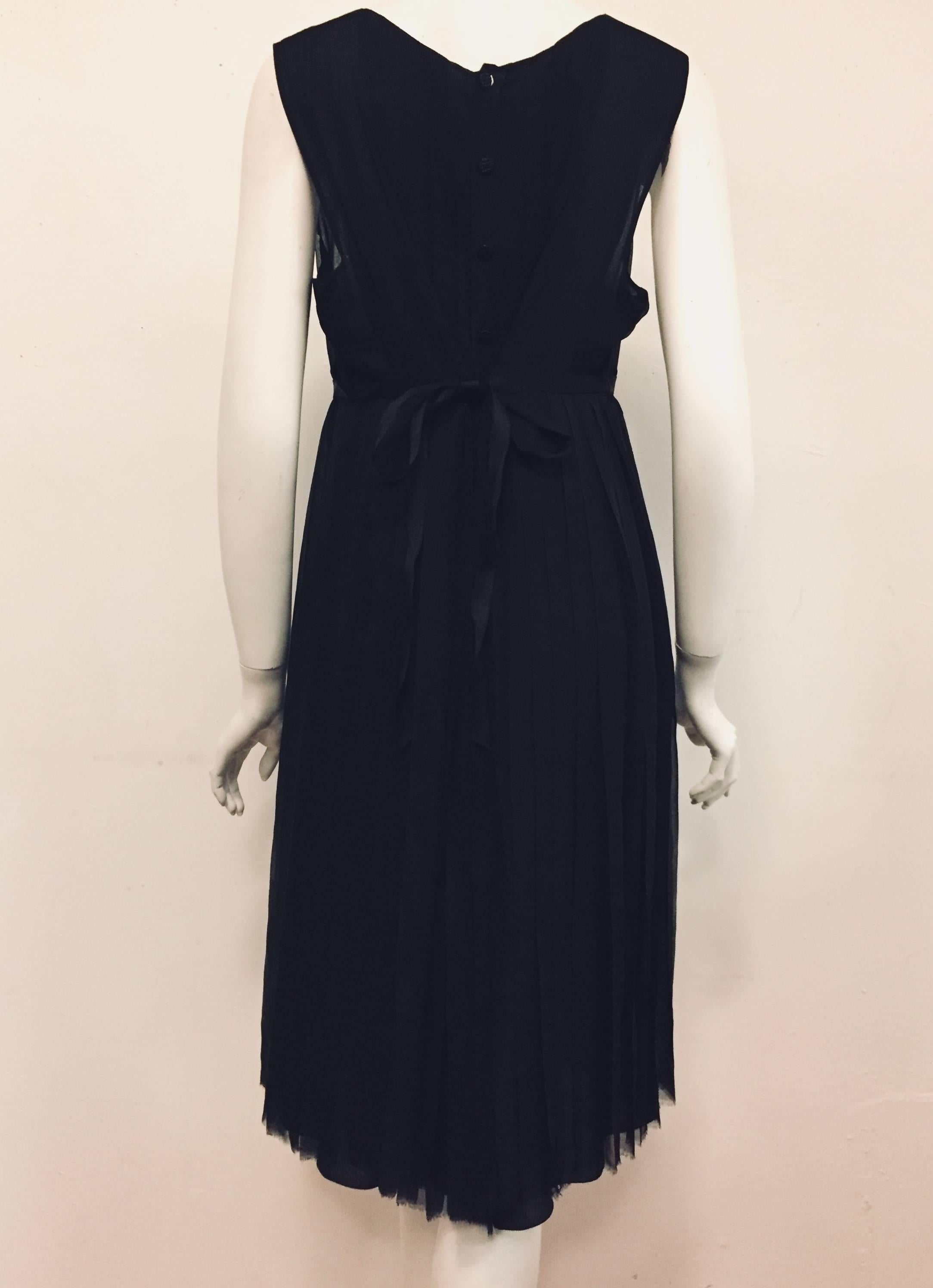 Chanel Black Sleeveless Silk Pleated Dress W Ribbon Tie Size 48 In Excellent Condition For Sale In Palm Beach, FL