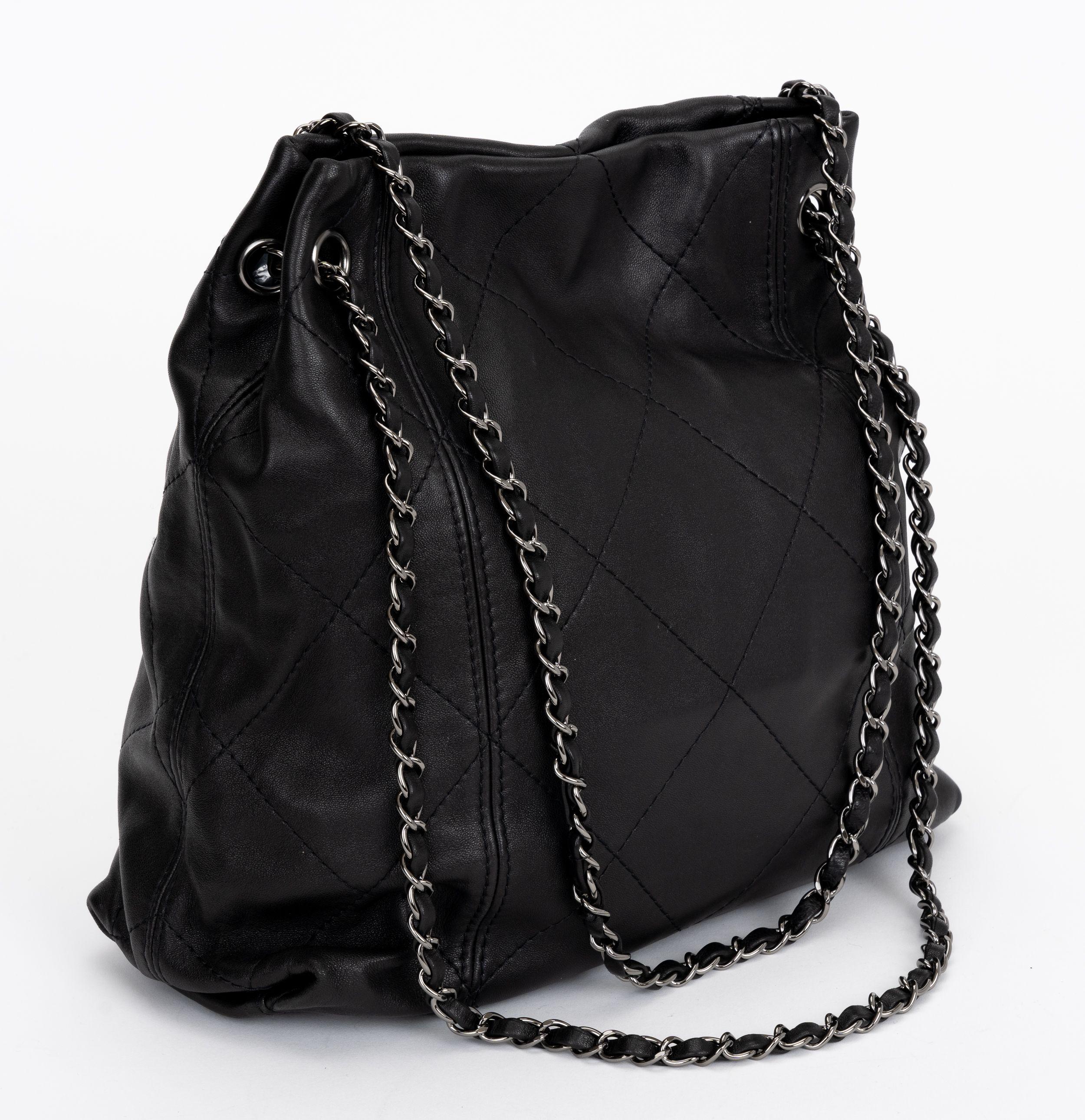 The Chanel Soft Touch Tote Quilted Lambskin, features woven in leather chain, with dangling CC's.
Shoulder drop 13.5