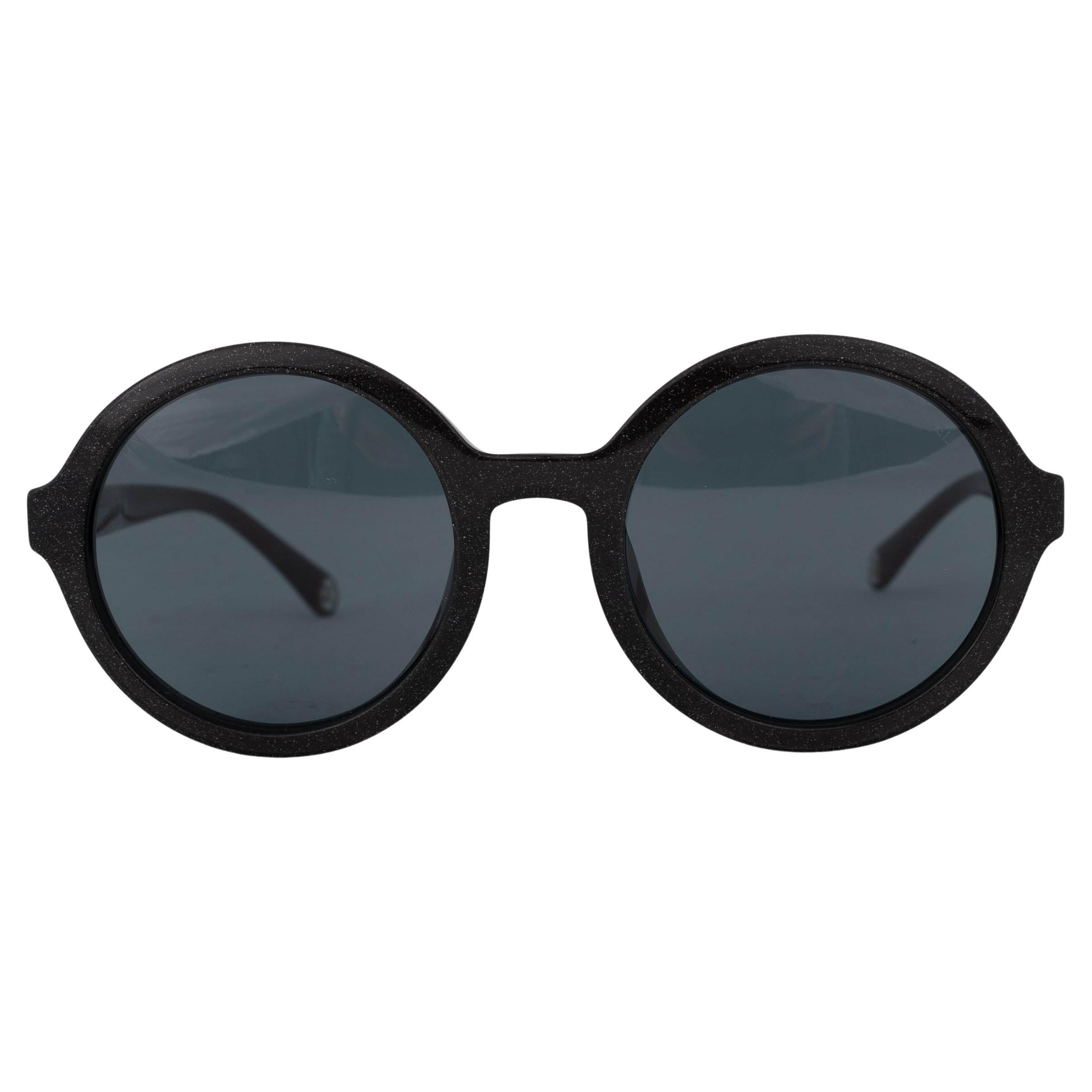What brand of glasses did Elvis wear?