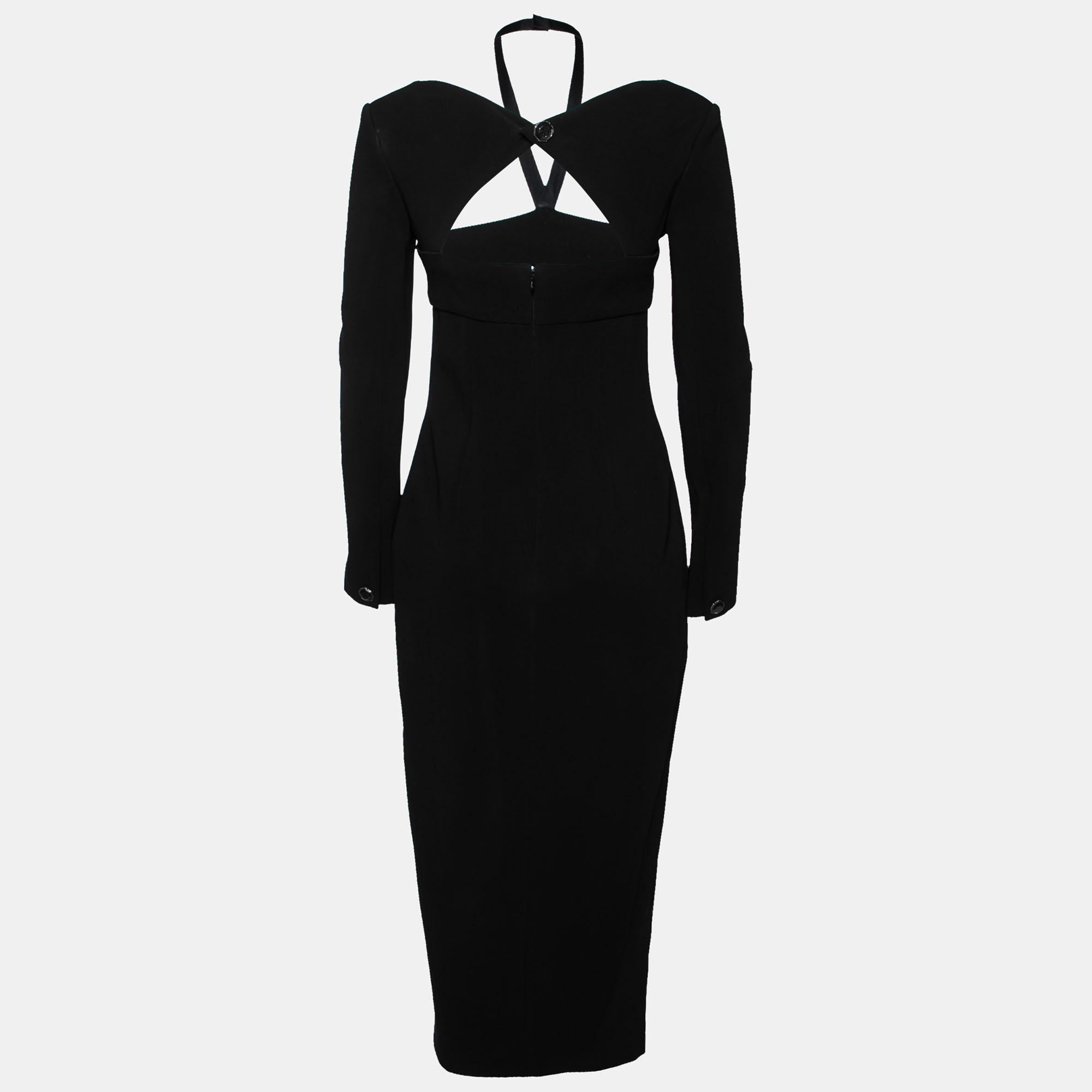 Show your love for understated fashion by donning this elegant dress from Chanel. It comes draped in fine materials with a midi-length and long sleeves. The black dress is truly flattering and has a cut-out detail at the back. It will look wonderful