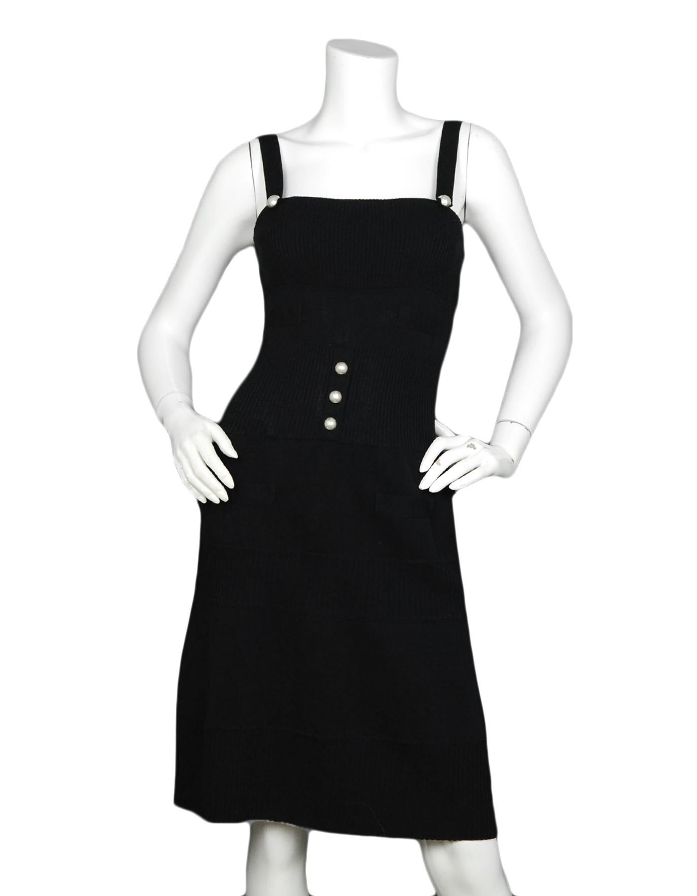 Chanel Black Stretch Sleeveless Dress w/ Pearl Buttons sz 38

Made In: Italy
Color: Black
Materials: 68% Cotton, 32% Nylon
Lining: 68% Cotton, 32% Nylon
Opening/Closure: Back zipper
Overall Condition: Excellent pre-owned condition

Tag Size: FR 38