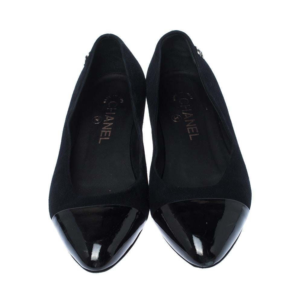 You would never want to take off these comfortable Chanel ballet flats. They are crafted from suede and designed with patent leather cap toes, CC logo details and leather insoles for added ease.

Includes: The Luxury Closet Packaging


