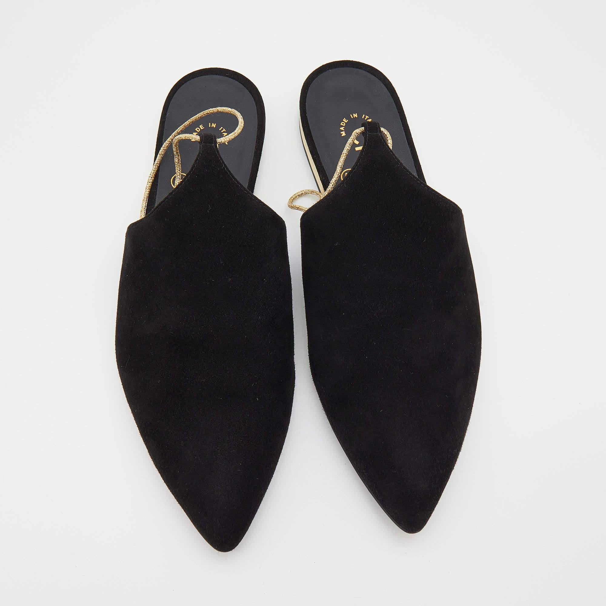 From their Cruise 2015 Collection, these Chanel mules carry a black suede exterior, pointed toes, and metallic wraps at the ankle. Complete with the signature CC on the rear, this fabulous pair will make you fall in love with shoes all over