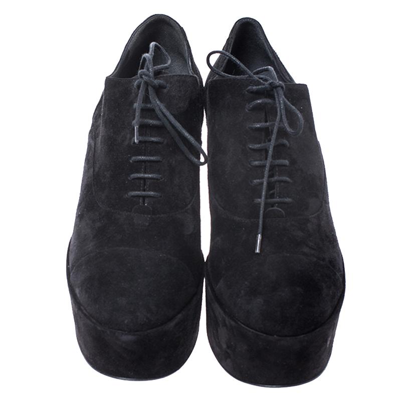 These suede oxfords are exclusively crafted for you They feature covered toes, laces on the vamps and platforms heels. The black shoes from Chanel will lend a stylish edge to your outfits.

Includes: Original Dustbag, Original Box