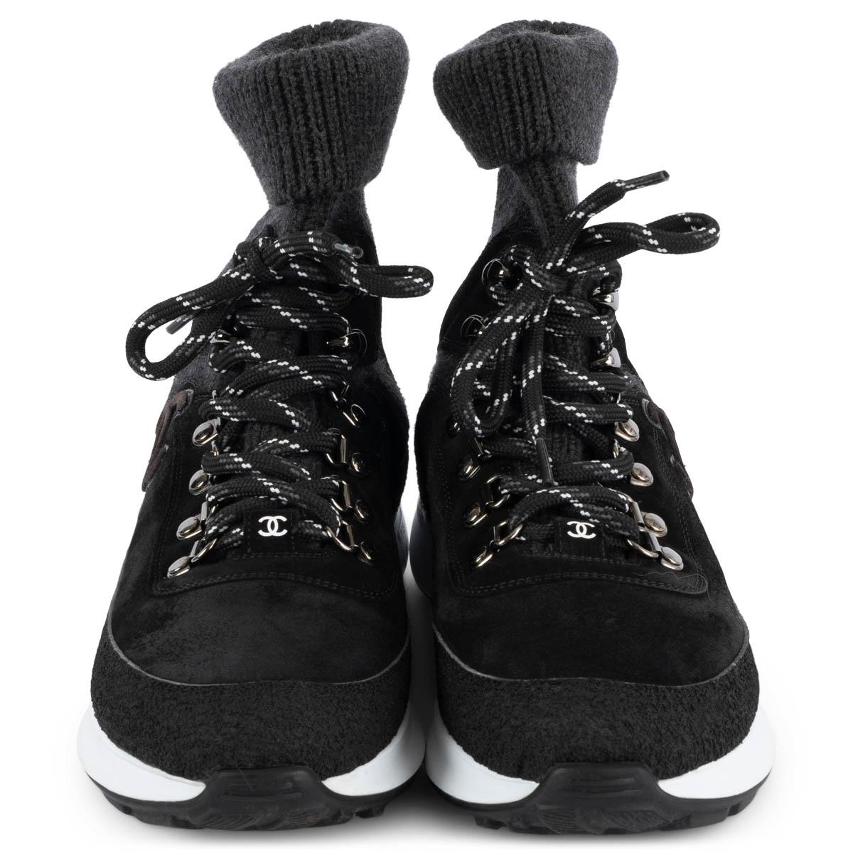 100% authentic Chanel 2021 lace-up high-top sock sneakers in black suede, rubber and anthracite rib knit set on a white rubber sole. Have been worn and are in excellent condition. 

Measurements
Model	Chanel21K G38497 Y55617
Imprinted Size	38
Shoe