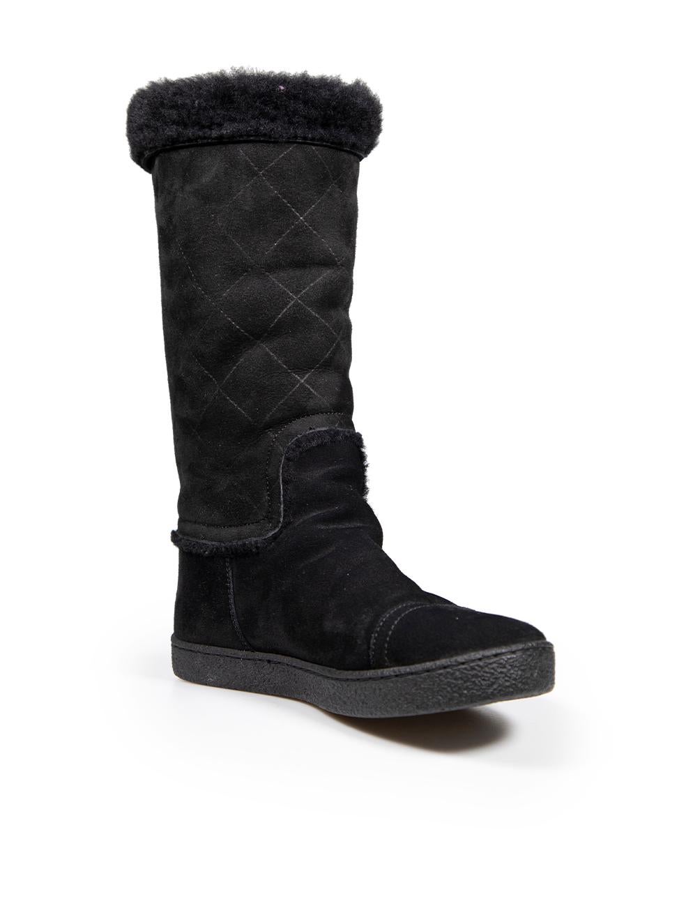 CONDITION is Very good. Minimal wear to boots is evident. Minimal wear to the left-side of the left boot and the right-side of the right boot, as well as the heels of both with light abrasions to the suede on this used Chanel designer resale item.
