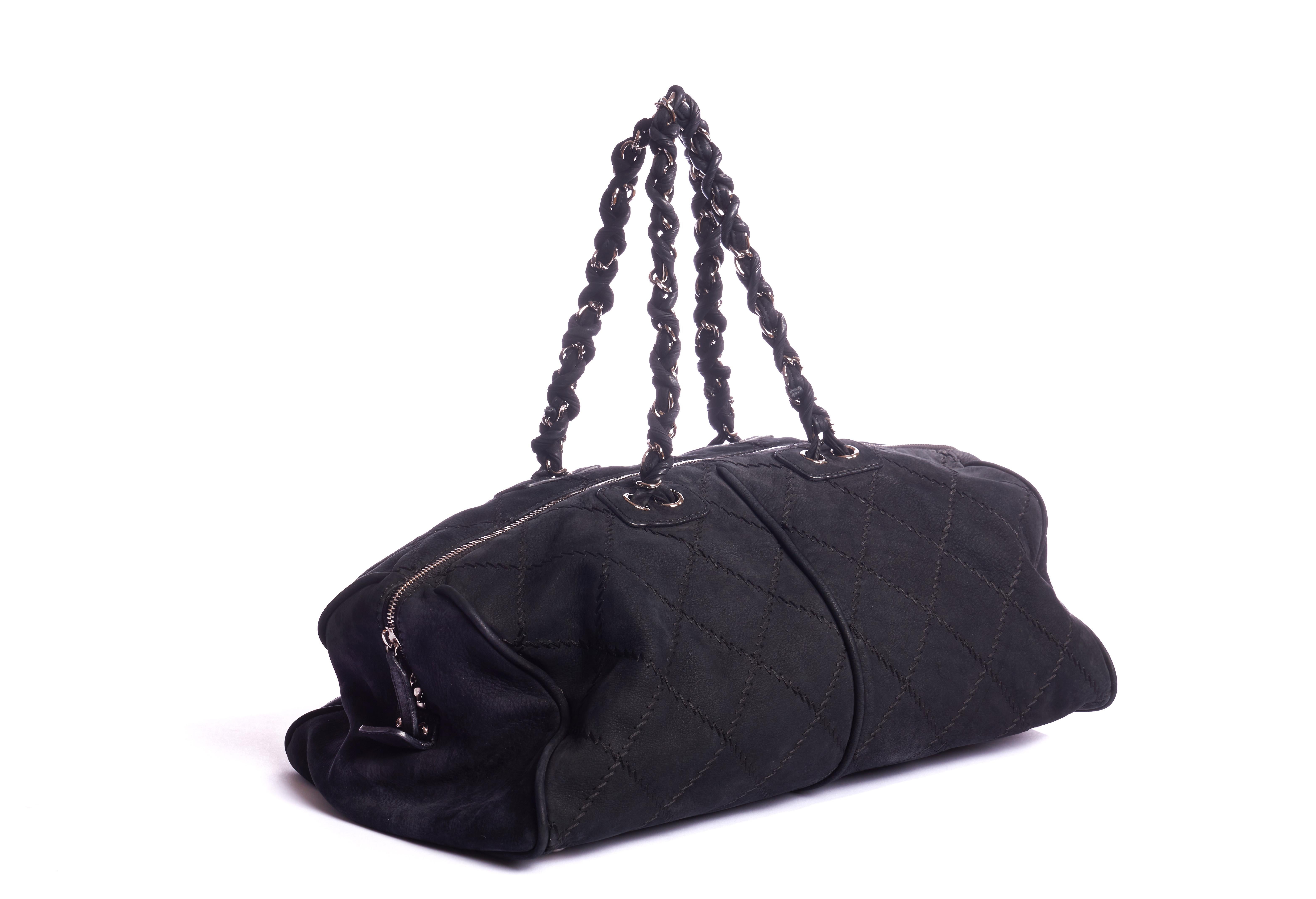 Chanel large black suede gym bag/weekender with gold tone hardware. Shoulder drop 8.5