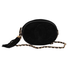 Chanel Mini bolso ovalado vintage de ante y piel negro con flecos atemporal