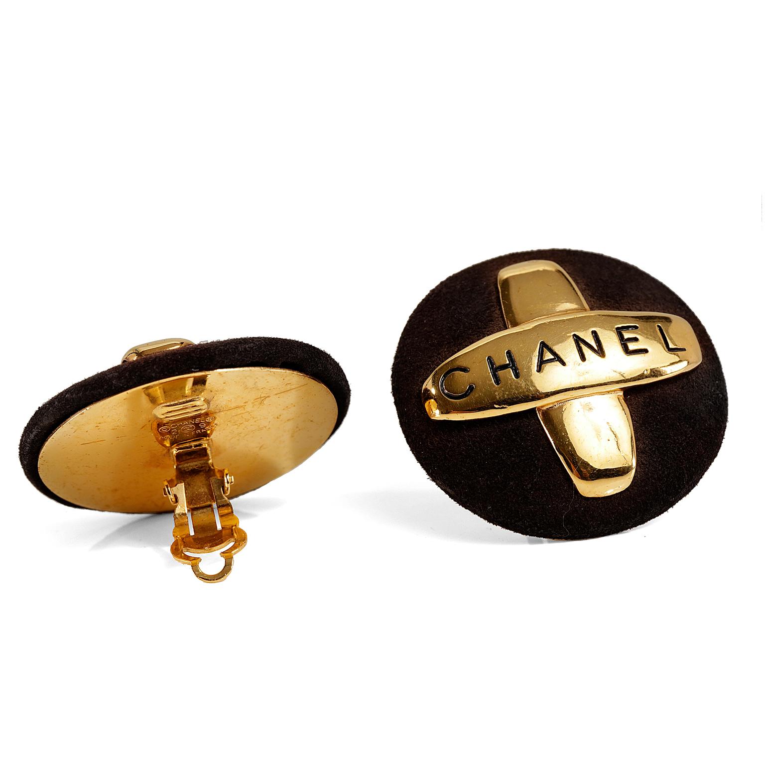 These authentic Chanel Brown Suede Maltese Cross Large Earrings are in very good condition from the season 29 collection, early 1990’s.  Black suede button earrings with CHANEL engraved gold tone cross.  Clip on style.  Made in France.  Box or pouch