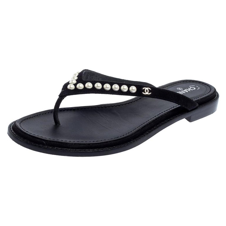 Chanel Black Suede Pearl Thong Flat Sandals Size 41 at 1stDibs  chanel  pearl thong sandals, black suede flat sandals, chanel white pearl sandals