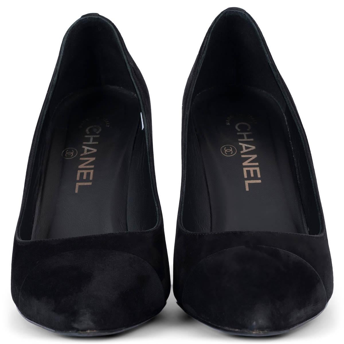 100% authentic Chanel pointed-toe pumps in black suede leather embellished with silver-tone CC logo on the heel. Have been worn and show some wear on the heel and the tip. Overall in very good condition. 

Measurements
Imprinted Size	38.5
Shoe