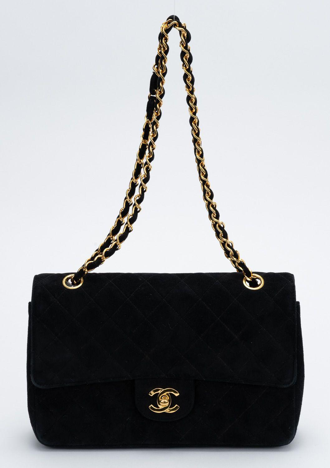 Chanel black classic suede single flap bag. Can be worn two ways: shoulder drop, 17.5