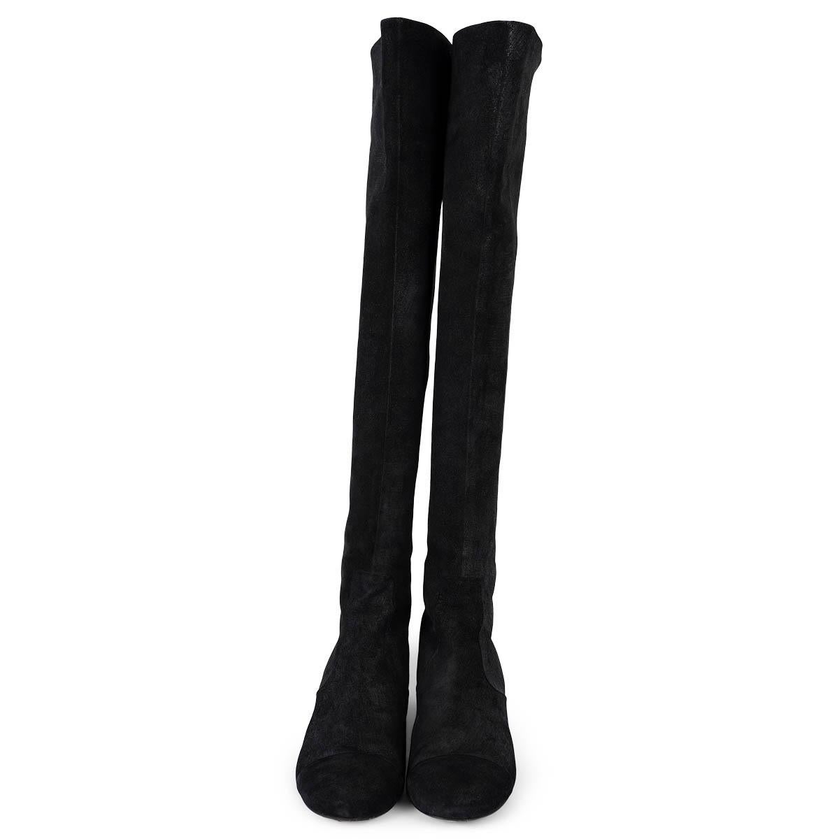 100% authentic Chanel over-knee boots in black textured suede featuring classic round cap toe and shiny black heel. Open with a zipper on the heel. Have been worn and are in excellent condition. 

Measurements
Model	G29233
Imprinted Size	39.5
Shoe