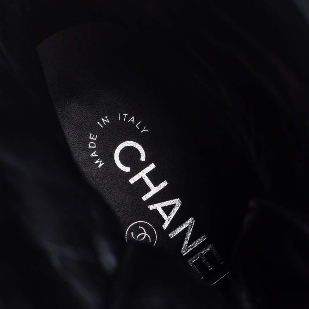Chanel creations are a sight to behold, for they are tailor-made to deliver sophistication, style and quality in spades. These combat boots are no different. They have been crafted from tween and suede and carry a classic shade of black. They are