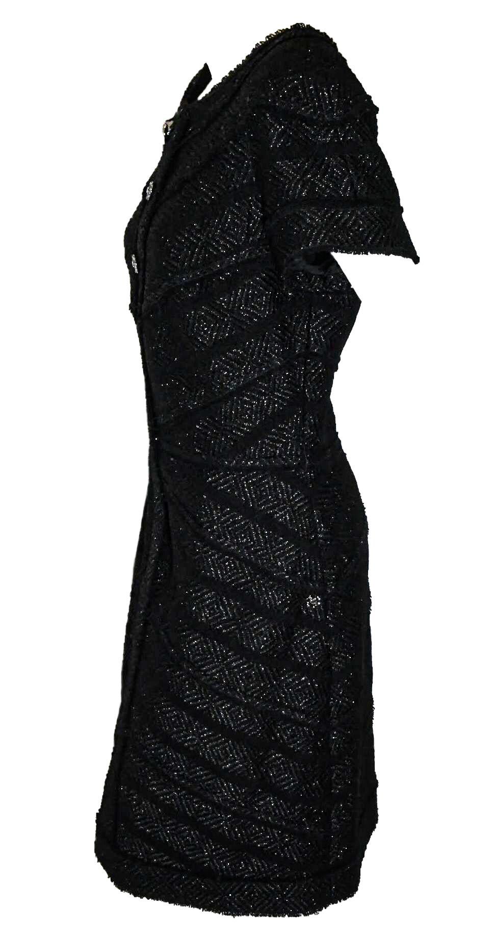 Chanel black tweed scoop collar chevron design with frayed edges dress from the fall 2008 collection contains 3 Chanel logo buttons a hidden zipper at front for closure.  This dress includes two side pockets at the hip with 2 Chanel logo buttons. 