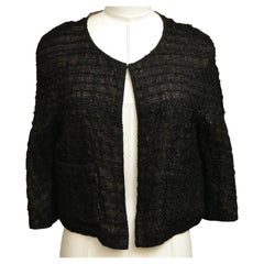CHANEL Veste en tweed noir fantaisie boutons crochets yeux poches chaîne or Sz 36 2012