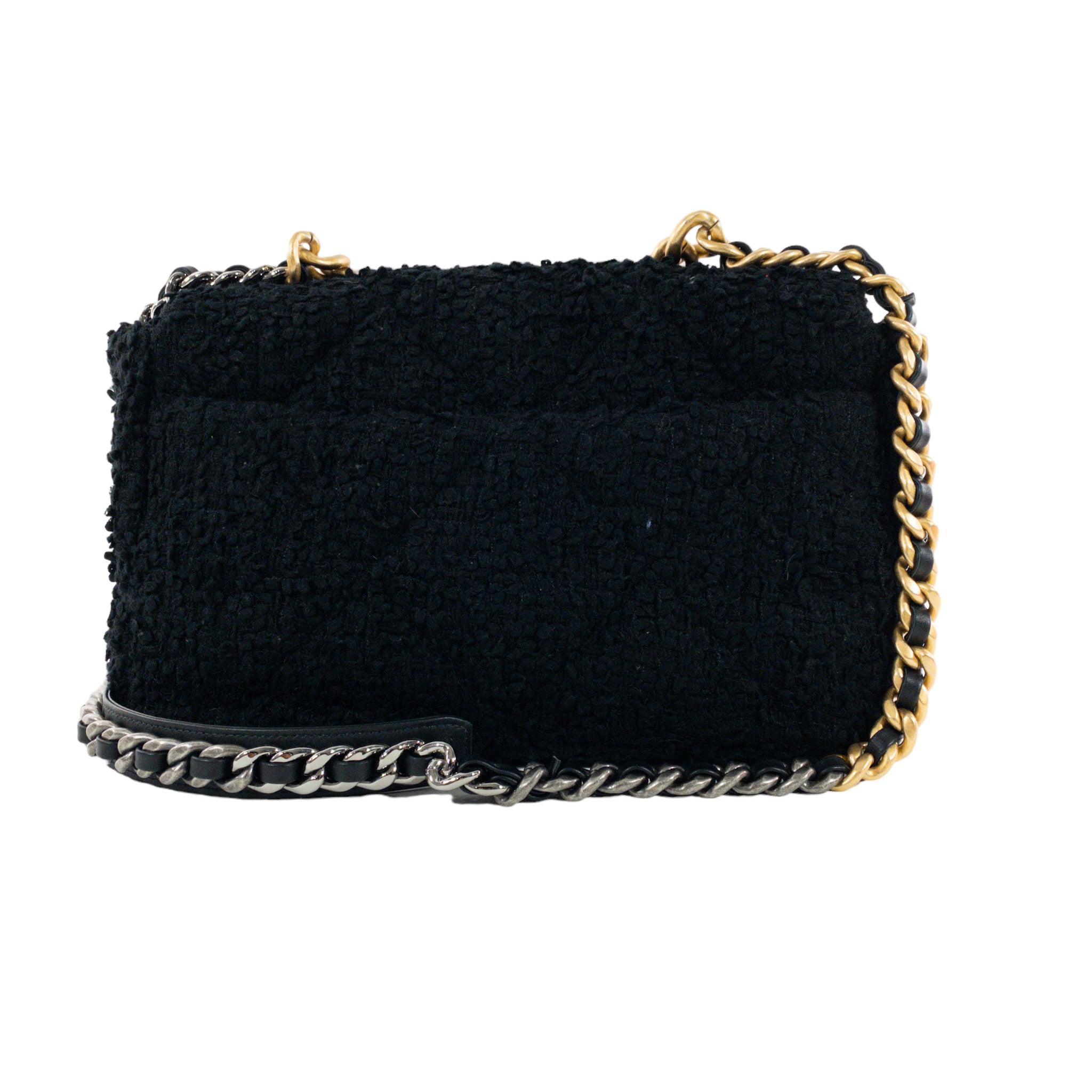 Chanel Black Tweed Large 

This is an authentic Chanel large 19. Black tweed exterior with large quilting and front flap. Woven leather chain CC turn clasp. Large spacious pocket in back with chain top handle and long chain shoulder strap. Interior