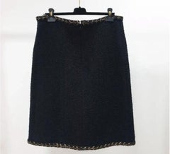 Jupe en tweed noir de Chanel Sz. 46