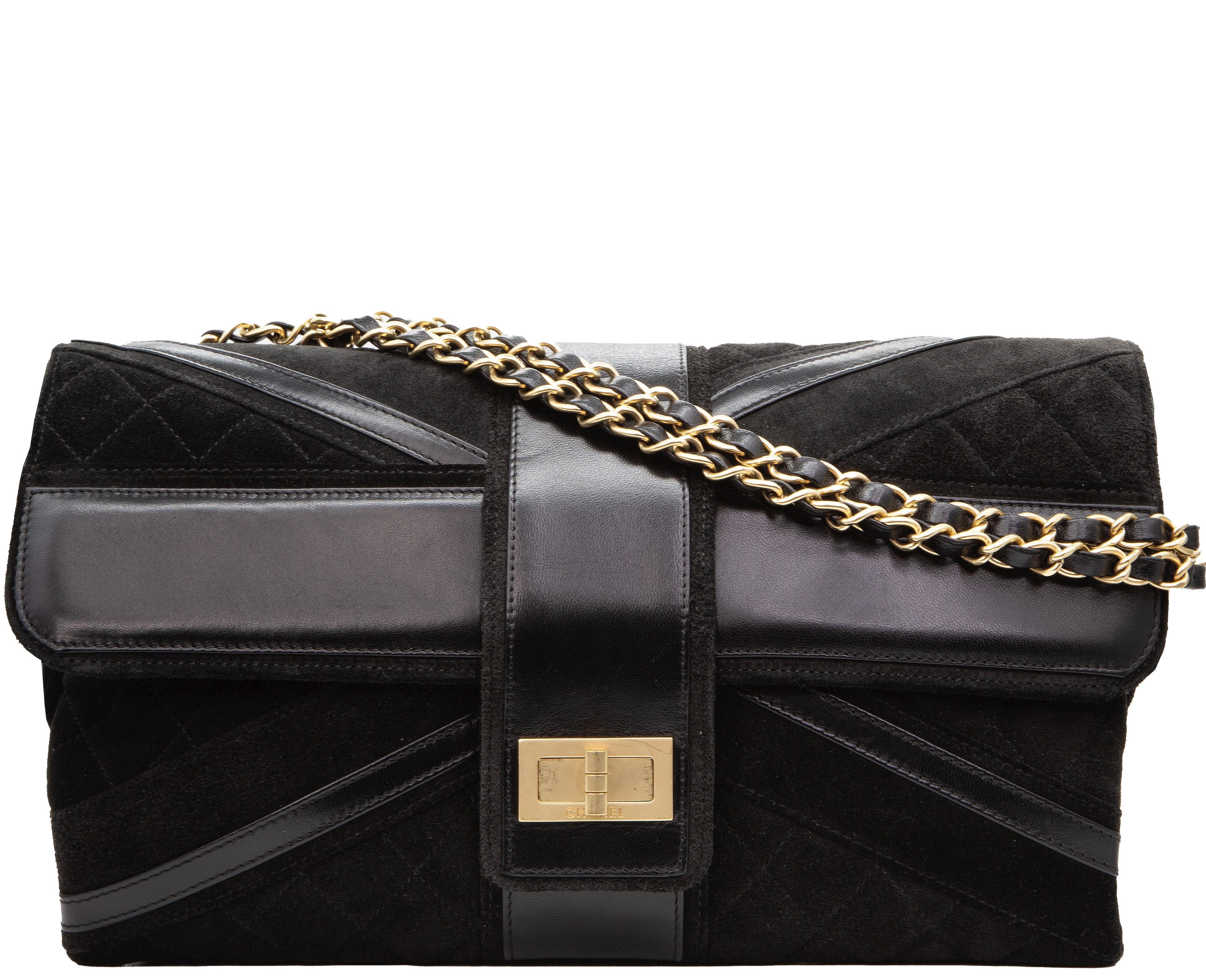 Crafted in suede and lambskin leather, this limited edition Chanel flap bag showcases the coveted union jack pattern. A beautiful gold hardware turn lock opens the bag to the main compartment and the woven chain leather strap can be worn as both a