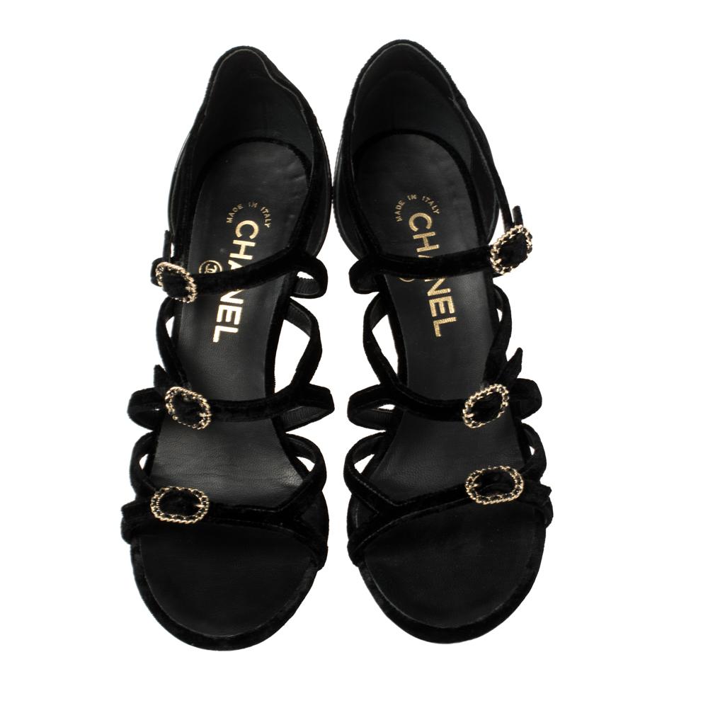 Wear these patent leather and velvet sandals when you go out and watch heads turn. Keep it light and simple with these high-heeled strappy sandals. Flaunt these fabulous sandals from Chanel as you step out in style. Exhibit your impressive styling