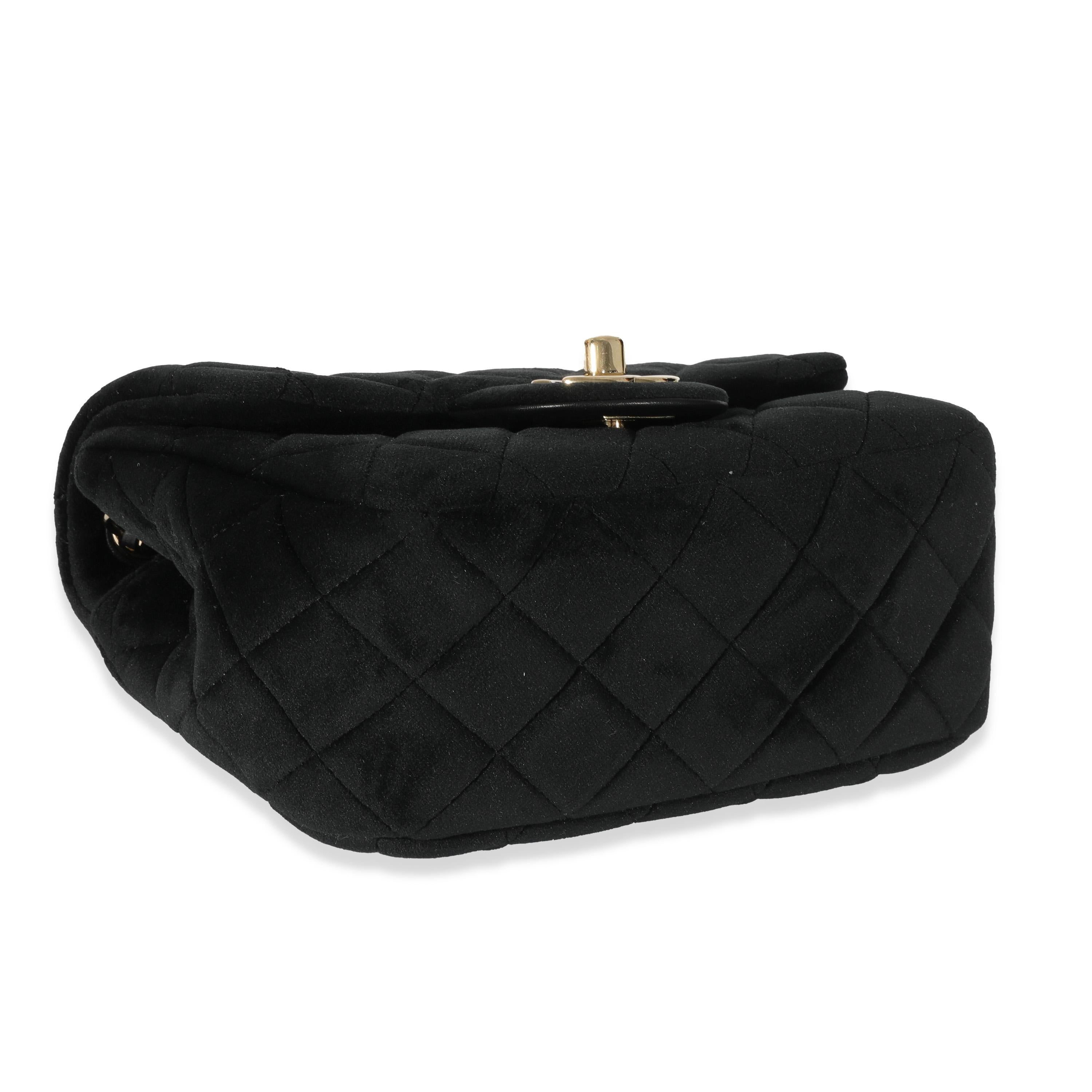 Listing Title: Chanel Black Velvet Pearl Crush Mini Square Flap
 SKU: 128588
 Condition: Pre-owned 
 Condition Description: A timeless classic that never goes out of style, the flap bag from Chanel dates back to 1955 and has seen a number of