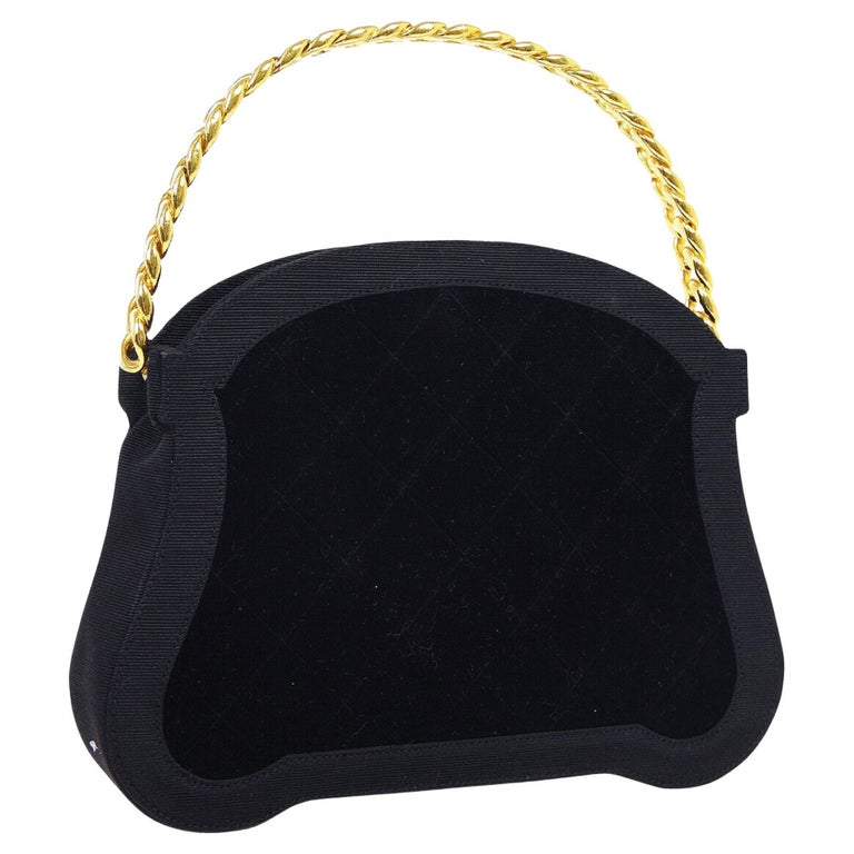Chanel Vintage Black Medallion Frame Clutch In Velvet With Gold Hardware &  Shiny Lizard Trim Available For Immediate Sale At Sotheby's