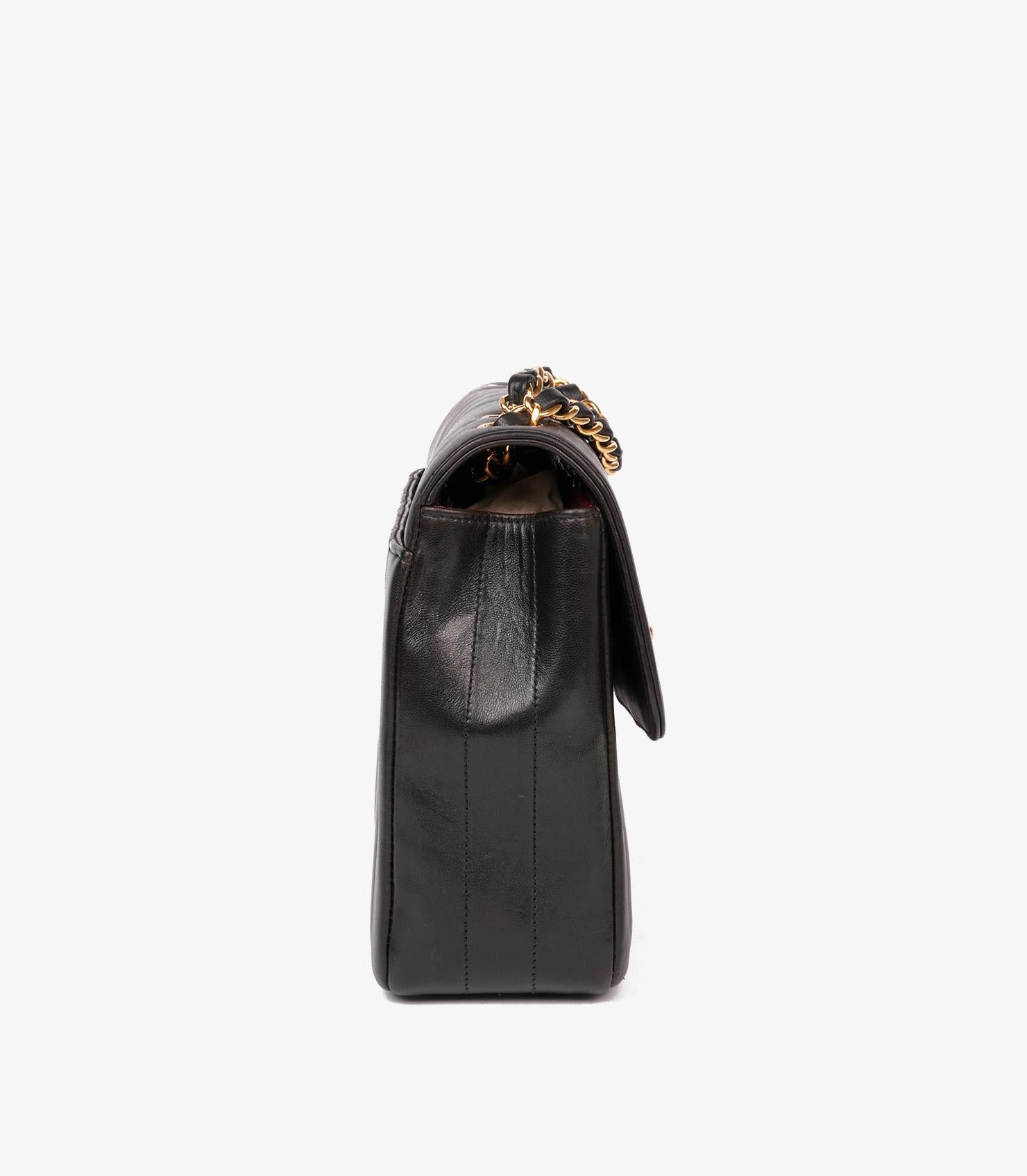 Women's or Men's Chanel Black Vertical Quilted Lambskin Leather Small Classic Single Flap Bag For Sale