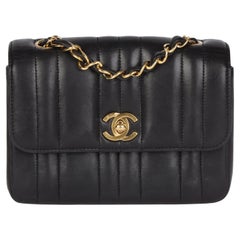 CHANEL Black Vertical Quilted Lambskin Retro Mini Flap Bag