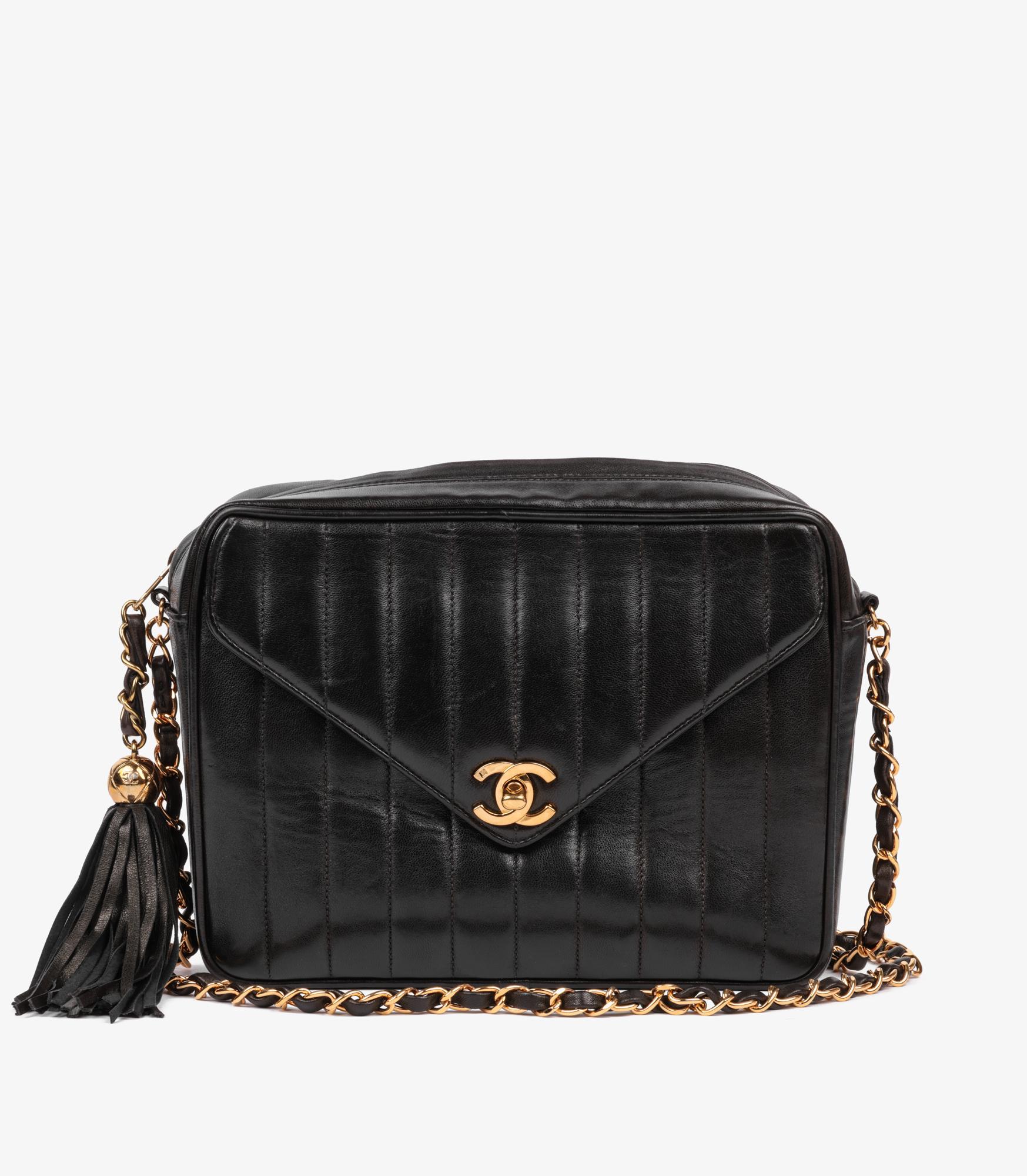 Chanel Black Vertical Quilted Lambskin Vintage Small Fringe Classic Camera Bag

Brand- Chanel
Model- Small Fringe Classic Camera Bag
Product Type- Crossbody, Shoulder
Serial Number- 2911597
Age- Circa 1991
Accompanied By- Chanel Dust Bag,