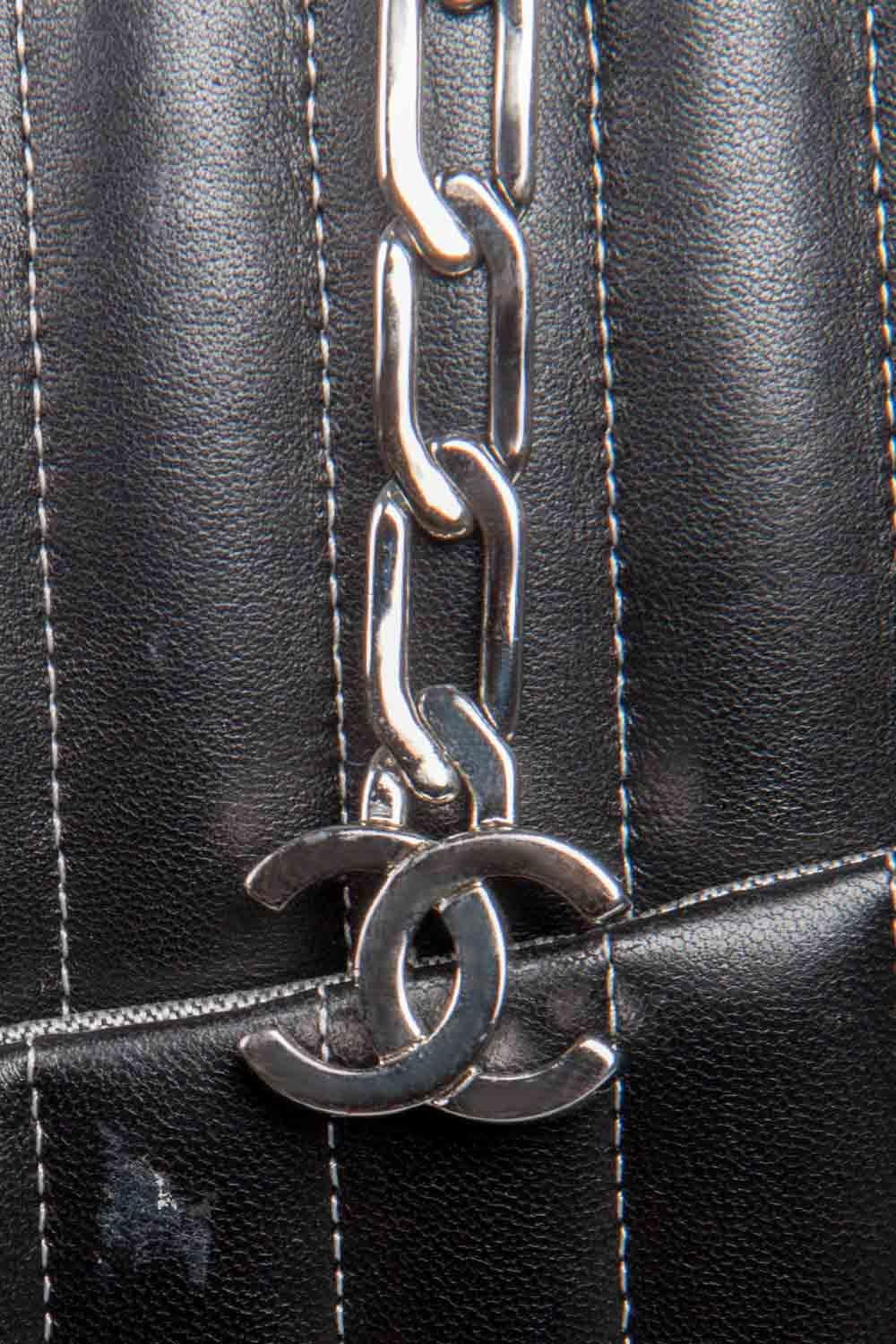 Chanel Black Vertical Quilted Leather Large Mademoiselle Tote In Fair Condition In Dubai, Al Qouz 2