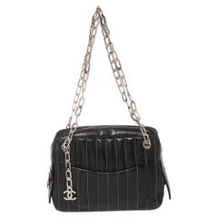 CHANEL CAMERA BAG MADEMOISELLE CLASP IN BLACK WHITE CANVAS HAND