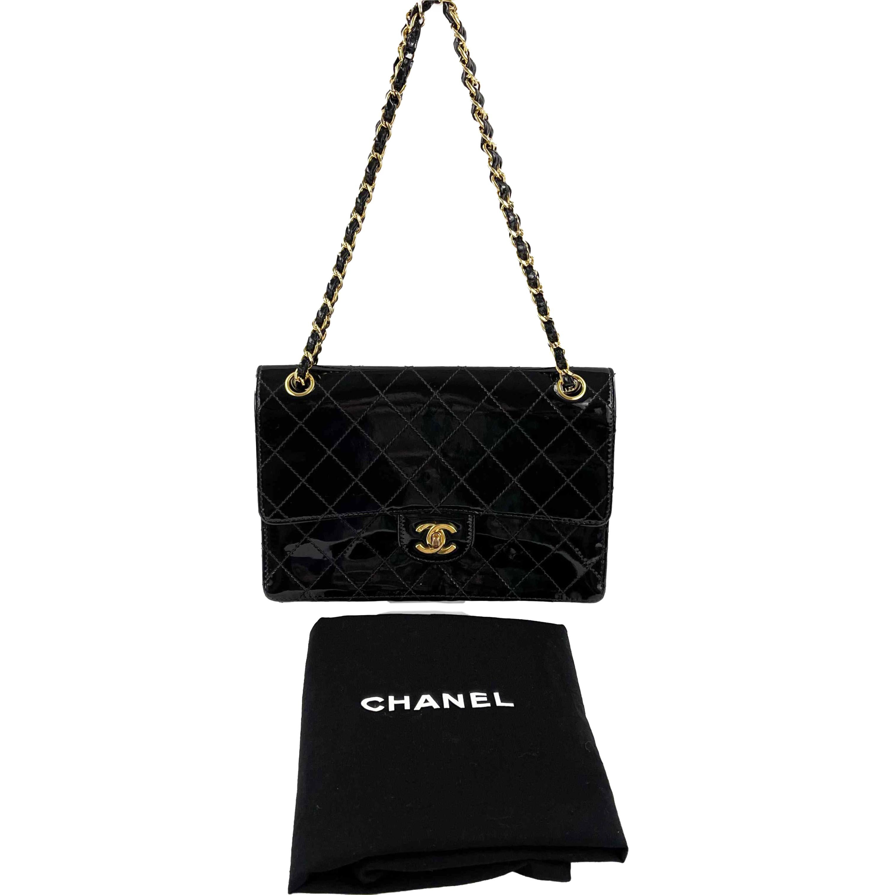 Chanel - Very Good - Vintage Patent Quilted Flap Bag - Black - Handbag

Description

* This beautiful Chanel handbag comes with a certificate of authenticity from Entrupy. The gold CC turnlock opens to a leather interior and will comfortably fit a