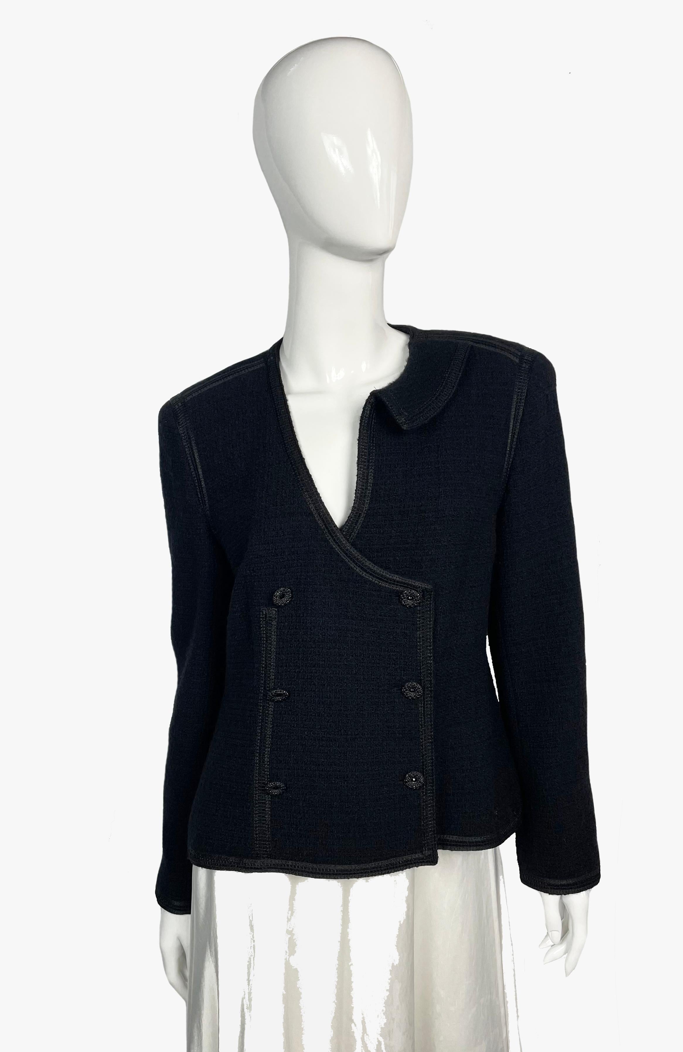Vintage Chanel black wool evening jacket from the Cruise 2002 Collection by Karl Lagerfeld. Collarless. Button closure. 
Size: L
Bust: 91cm
Length: 57cm
Sleeve: 67cm

Composition: 85% wool, 15% angora; lining: 95% silk, 5%
